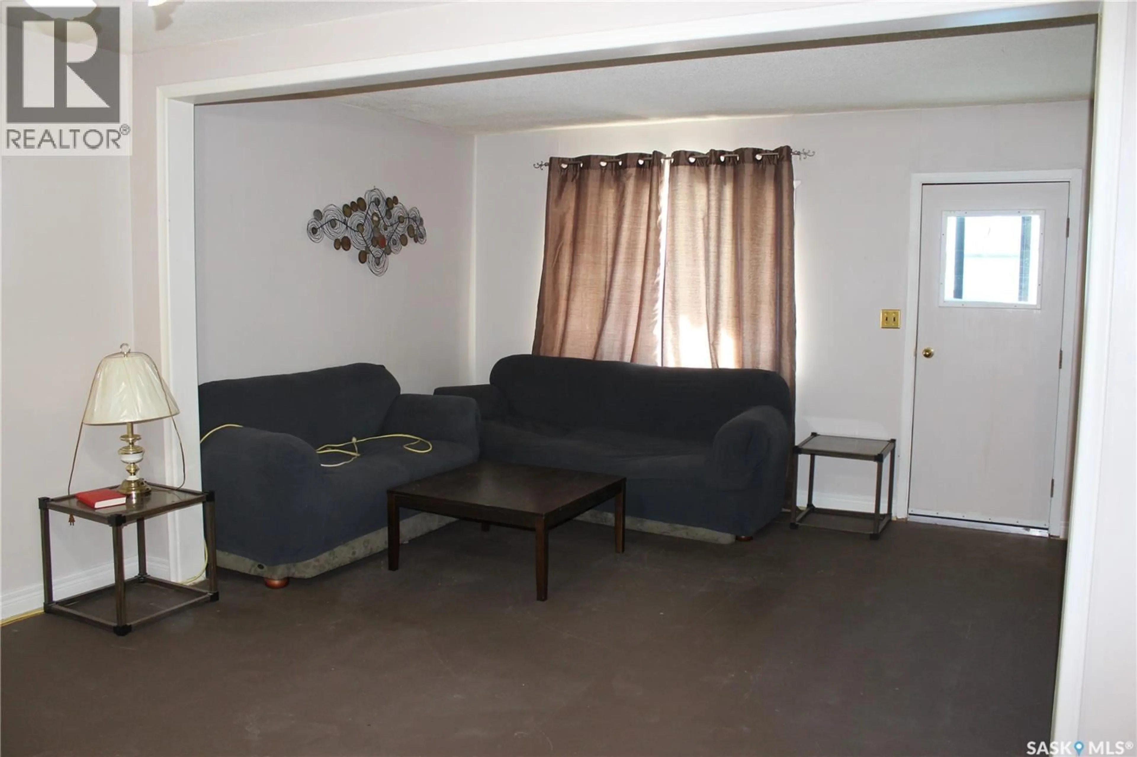 Living room with furniture, unknown for 210 TORBAY STREET, Torquay Saskatchewan S0C2L0