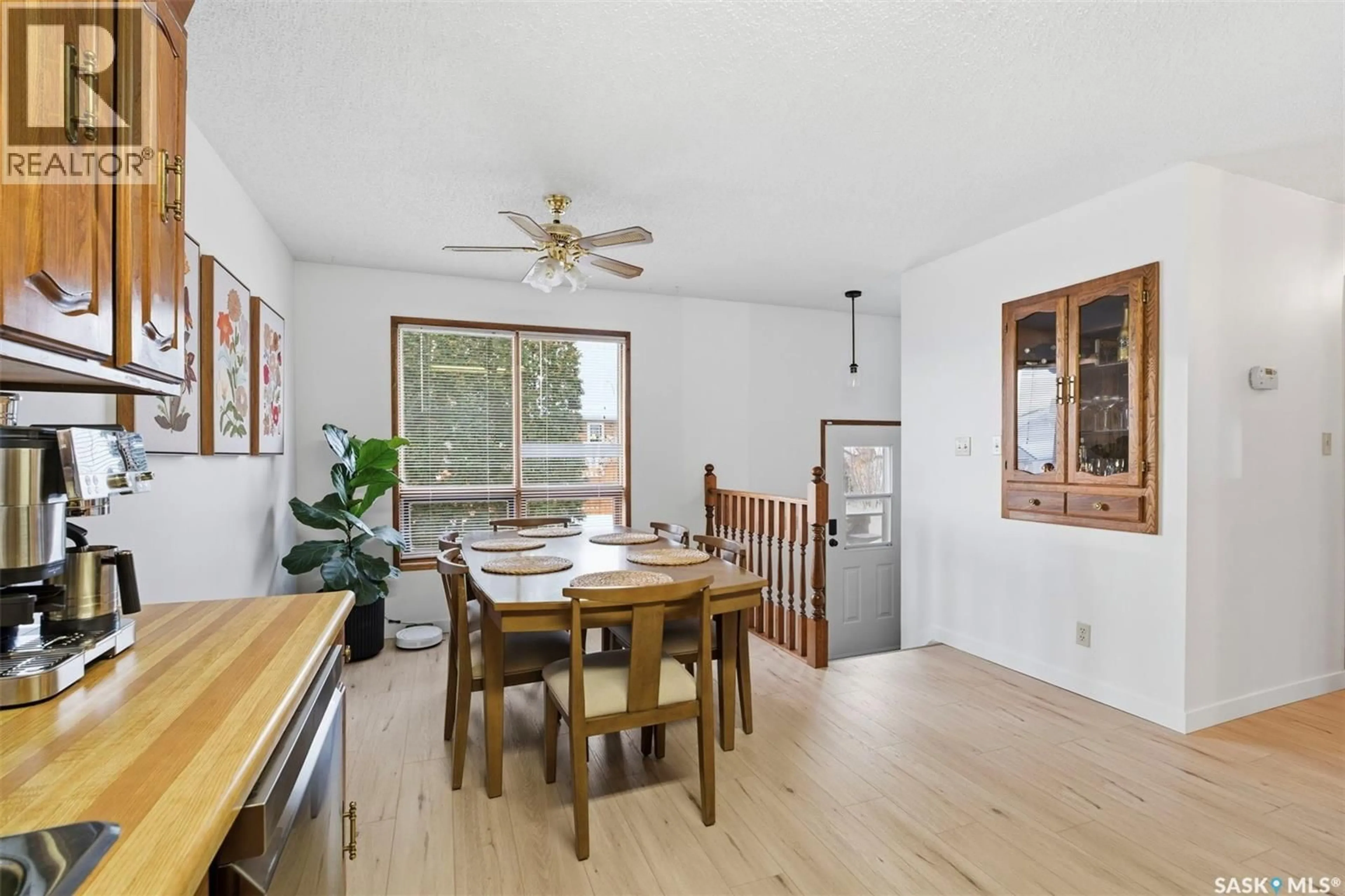 Dining room, wood/laminate floor for 439 MANNING LANE, Saskatoon Saskatchewan S7L6J7