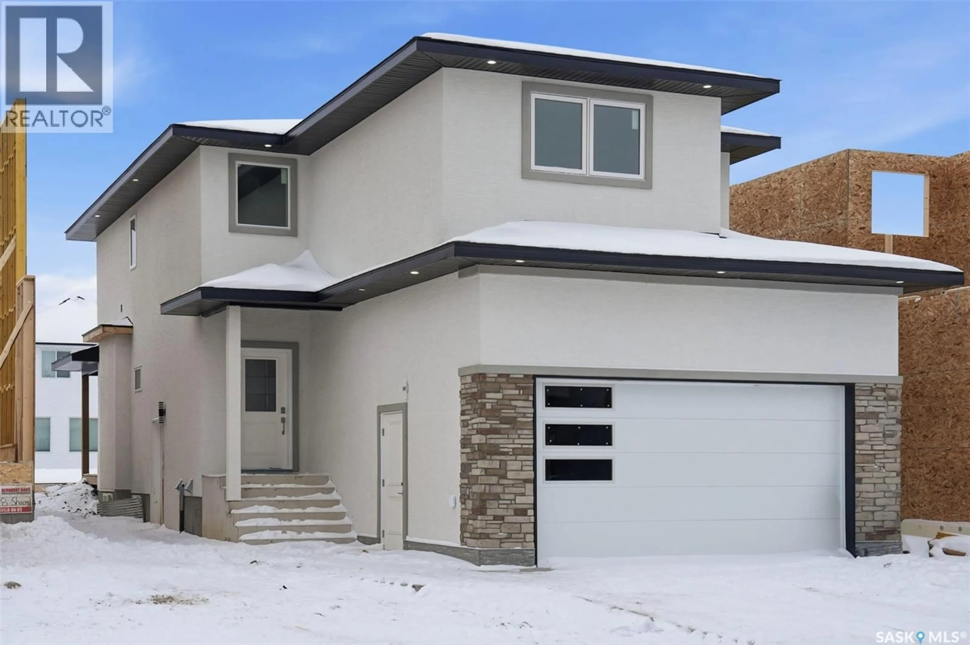 Home with vinyl exterior material, street for 142 SHARMA LANE, Saskatoon Saskatchewan S7W1L1