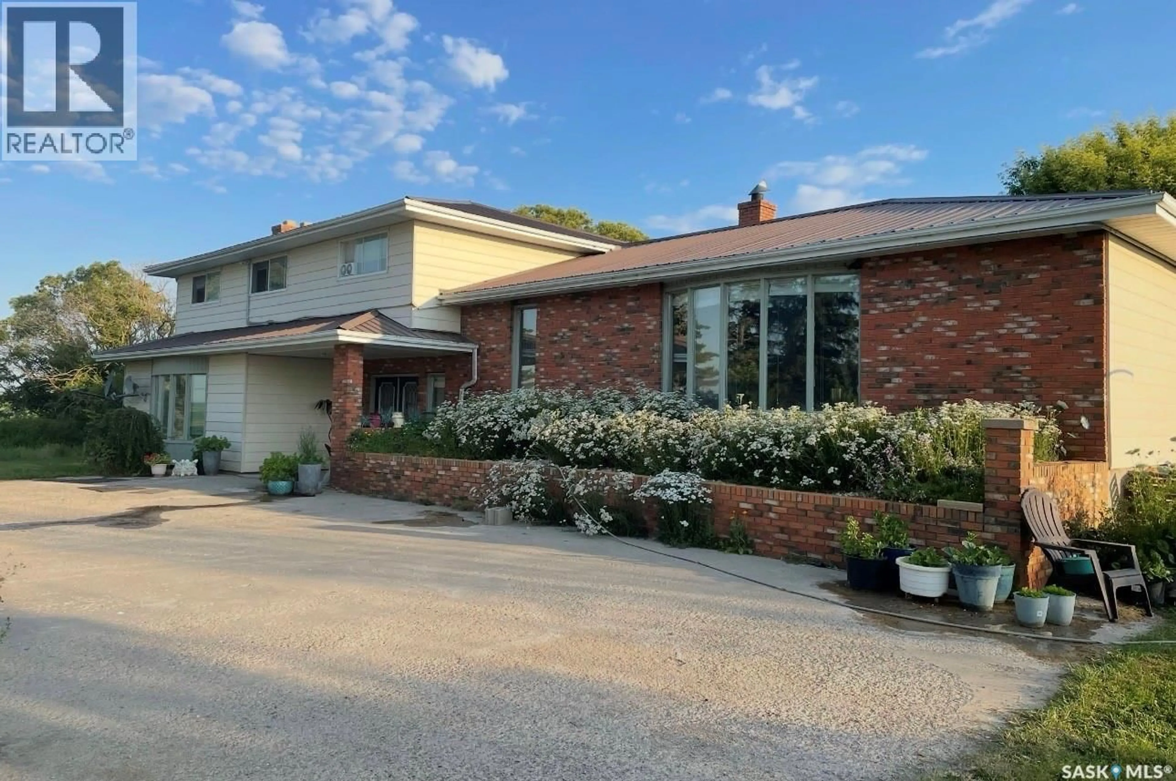 Home with brick exterior material, street for KIPPEN FARM, Shamrock Rm No. 134 Saskatchewan S0H3W0