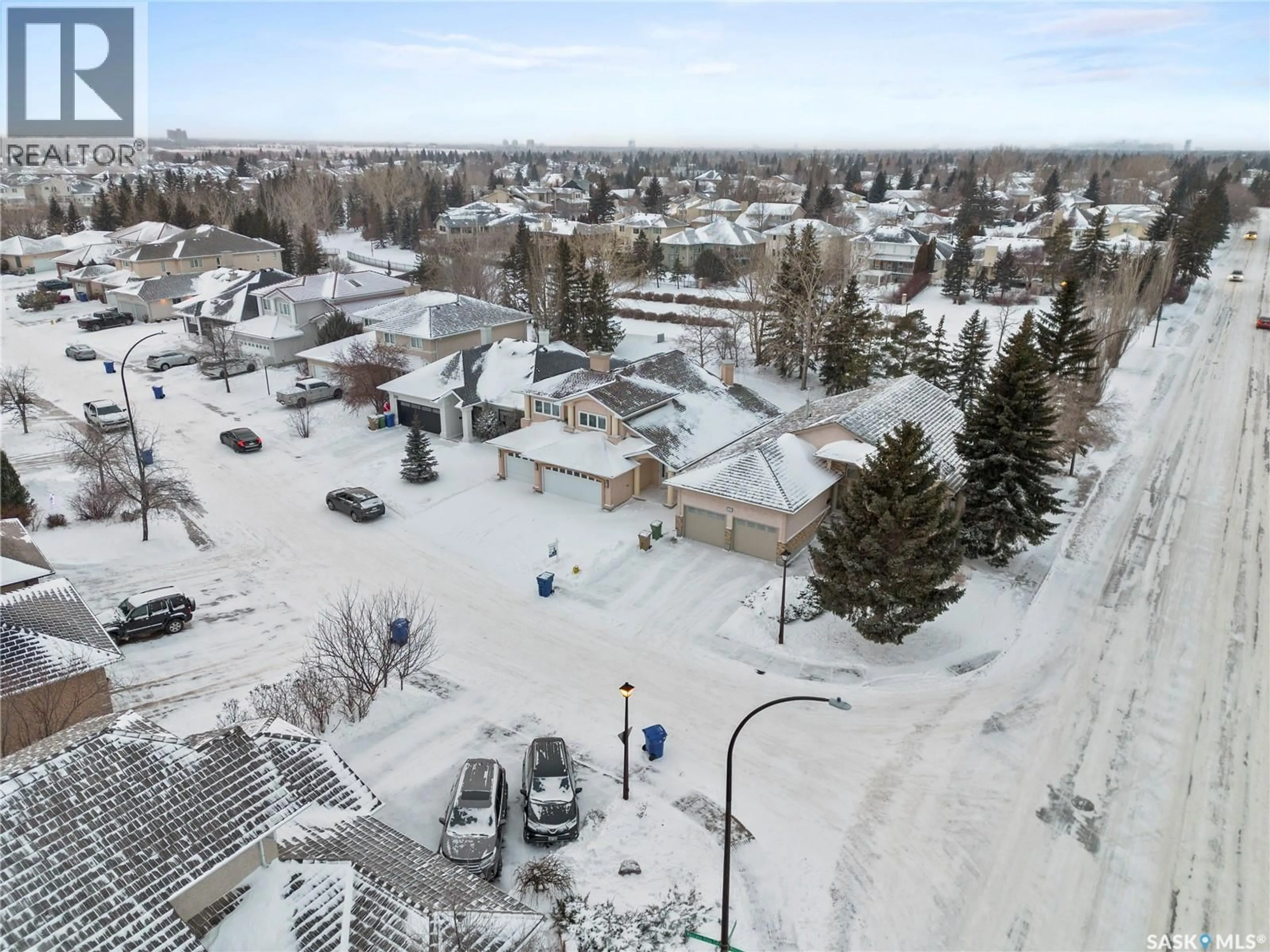 A pic from outside/outdoor area/front of a property/back of a property/a pic from drone, street for 5006 WASCANA VISTA COURT, Regina Saskatchewan S4V2S2