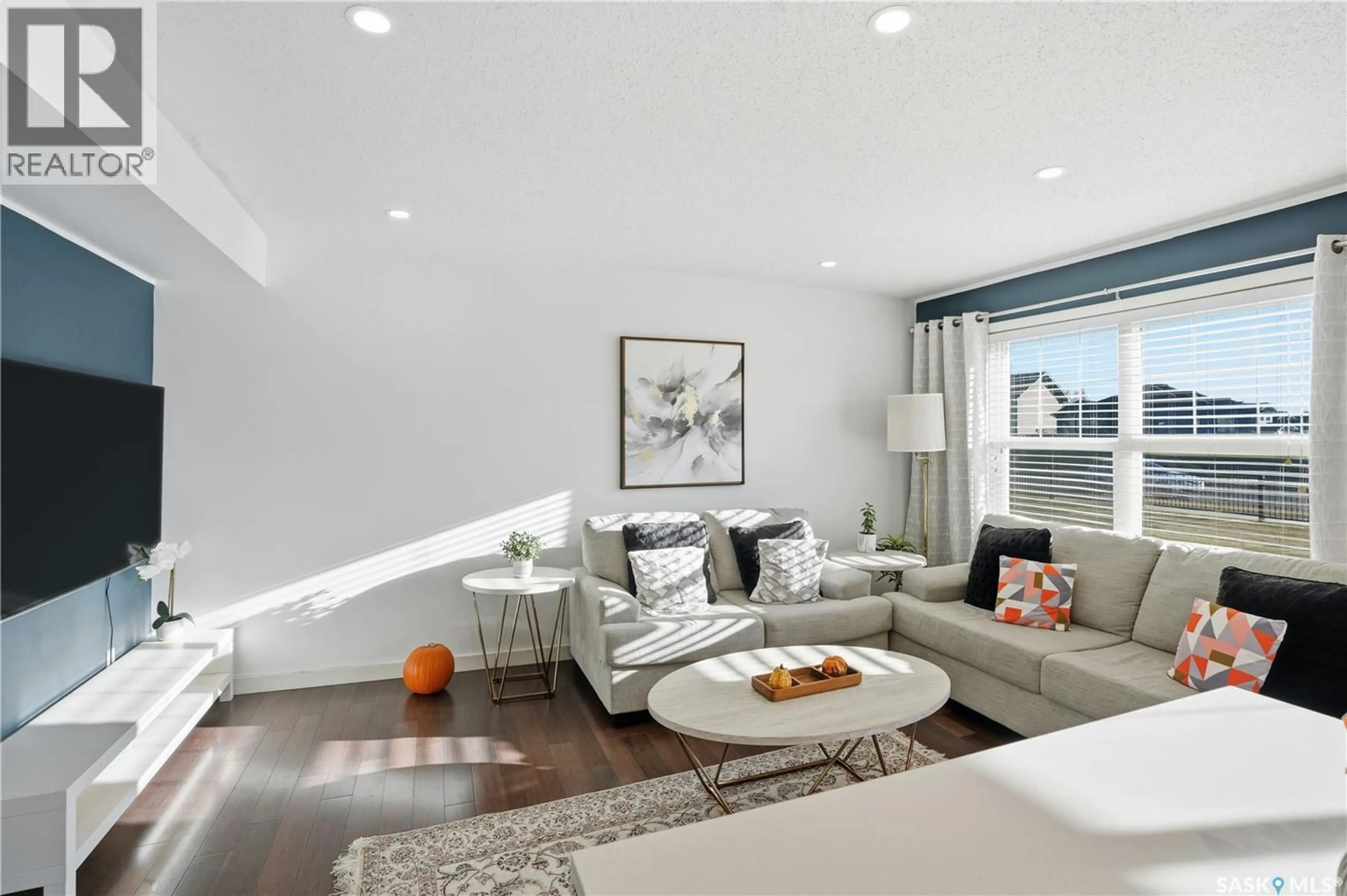 Living room with furniture, unknown for 106 - 410 LEDINGHAM WAY, Saskatoon Saskatchewan S7V0C4