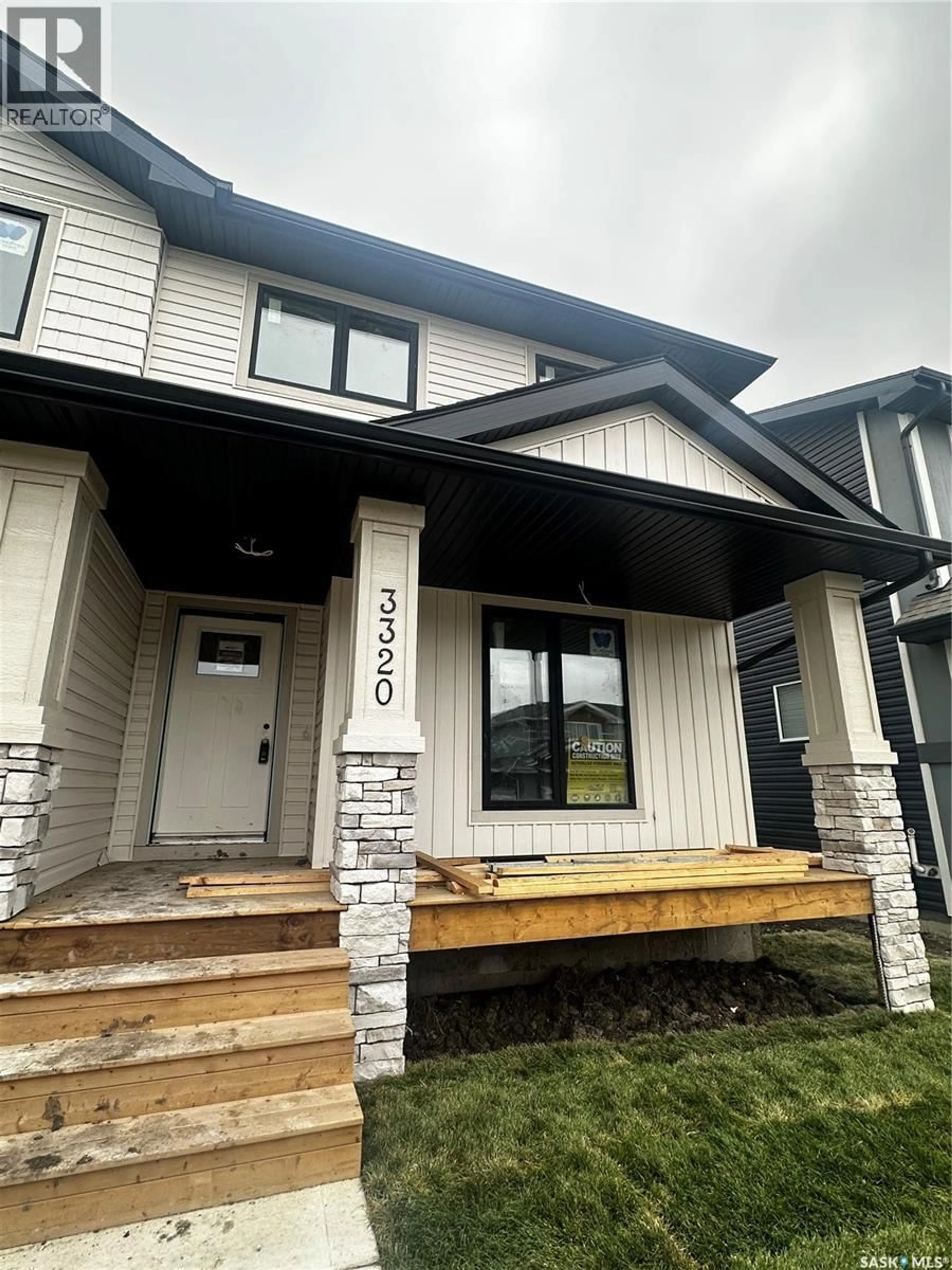 Home with vinyl exterior material, street for 3320 FAVEL DRIVE, Regina Saskatchewan S4V4A9