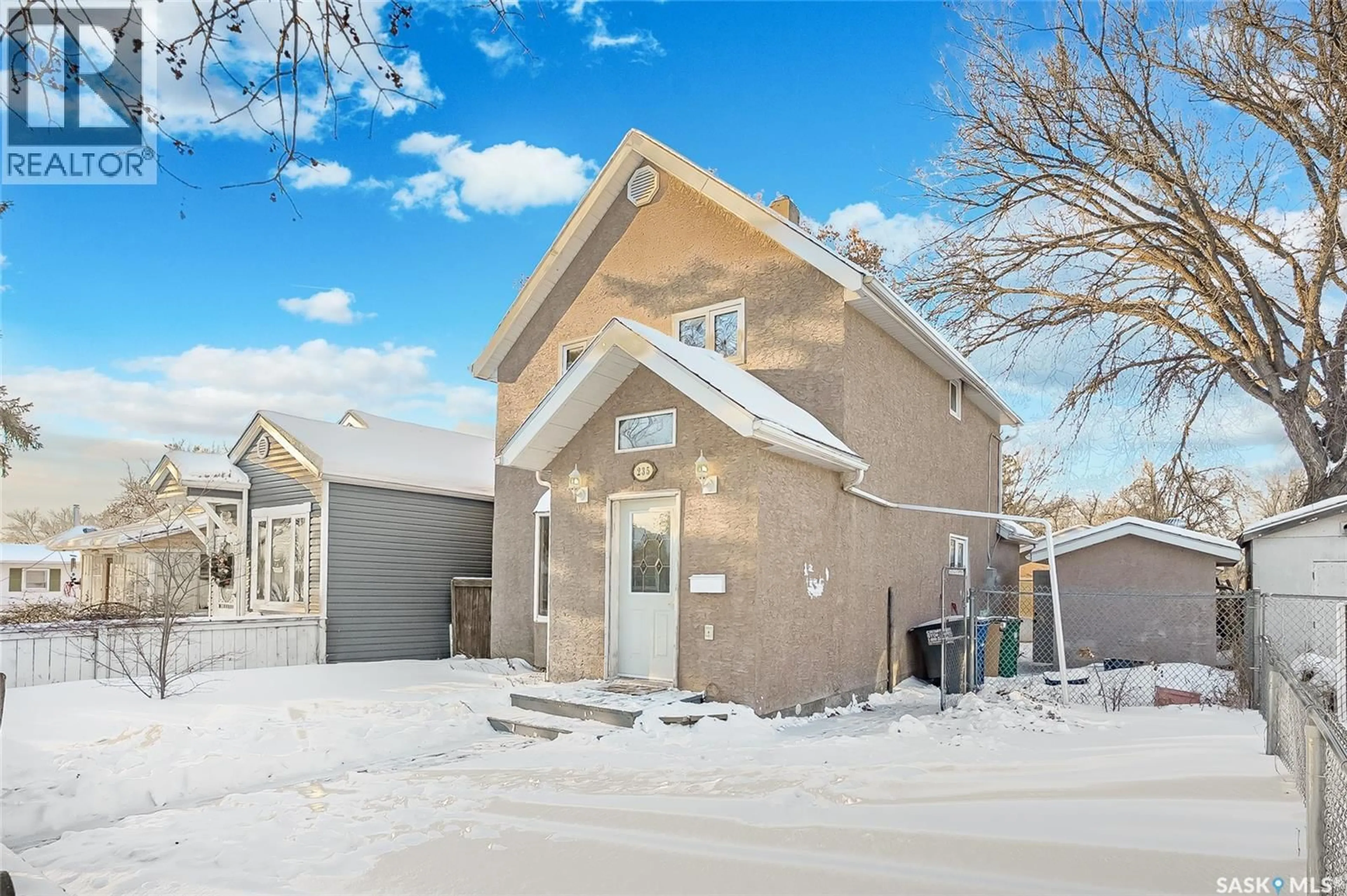 Home with brick exterior material, street for 235 J AVENUE, Saskatoon Saskatchewan S7L2J9