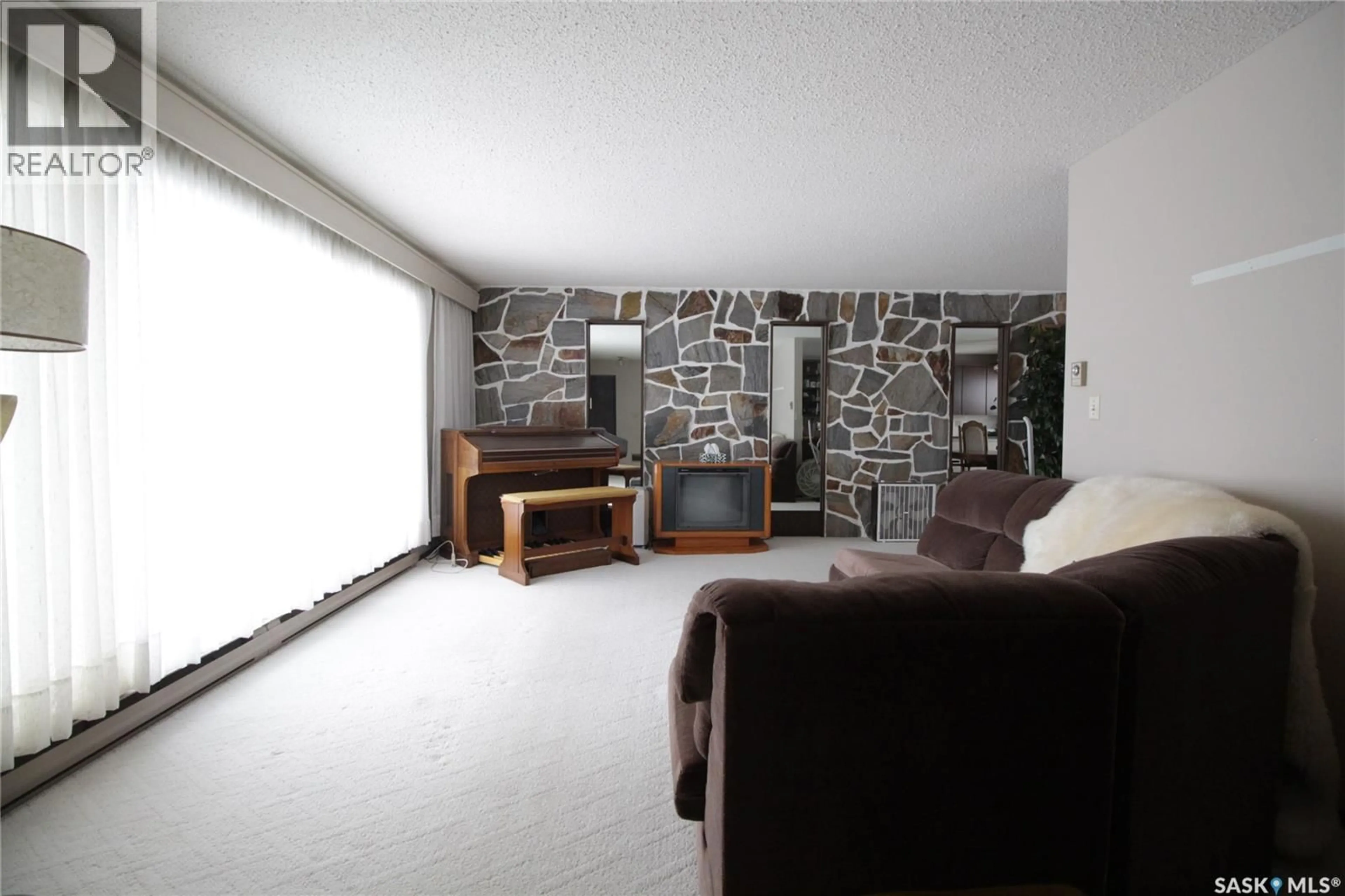 Living room with furniture, unknown for 609 OGILVIE STREET, Moosomin Saskatchewan S0G3N0