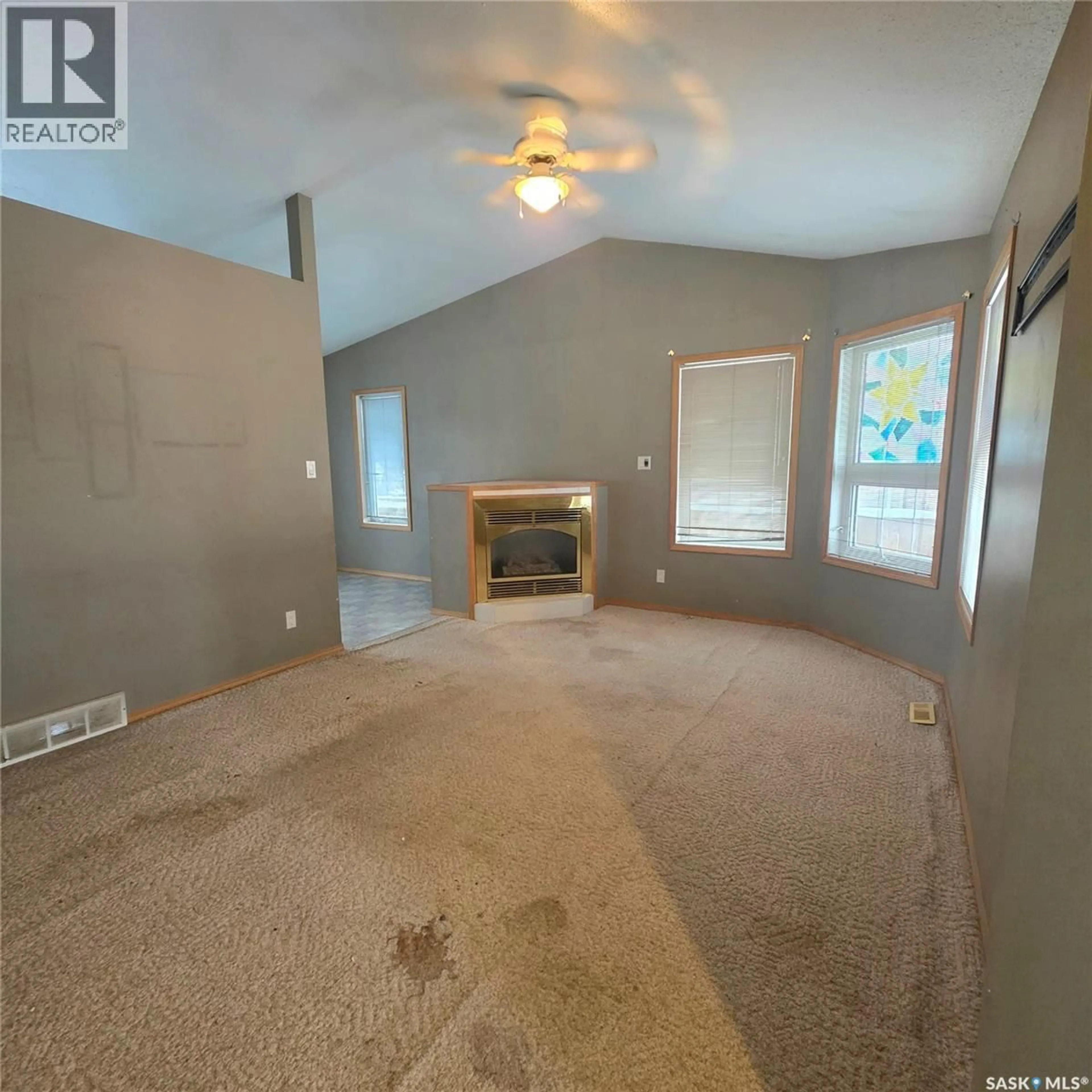Living room with furniture, unknown for 8 COUPLAND CRESCENT, Meadow Lake Saskatchewan S9X1B1