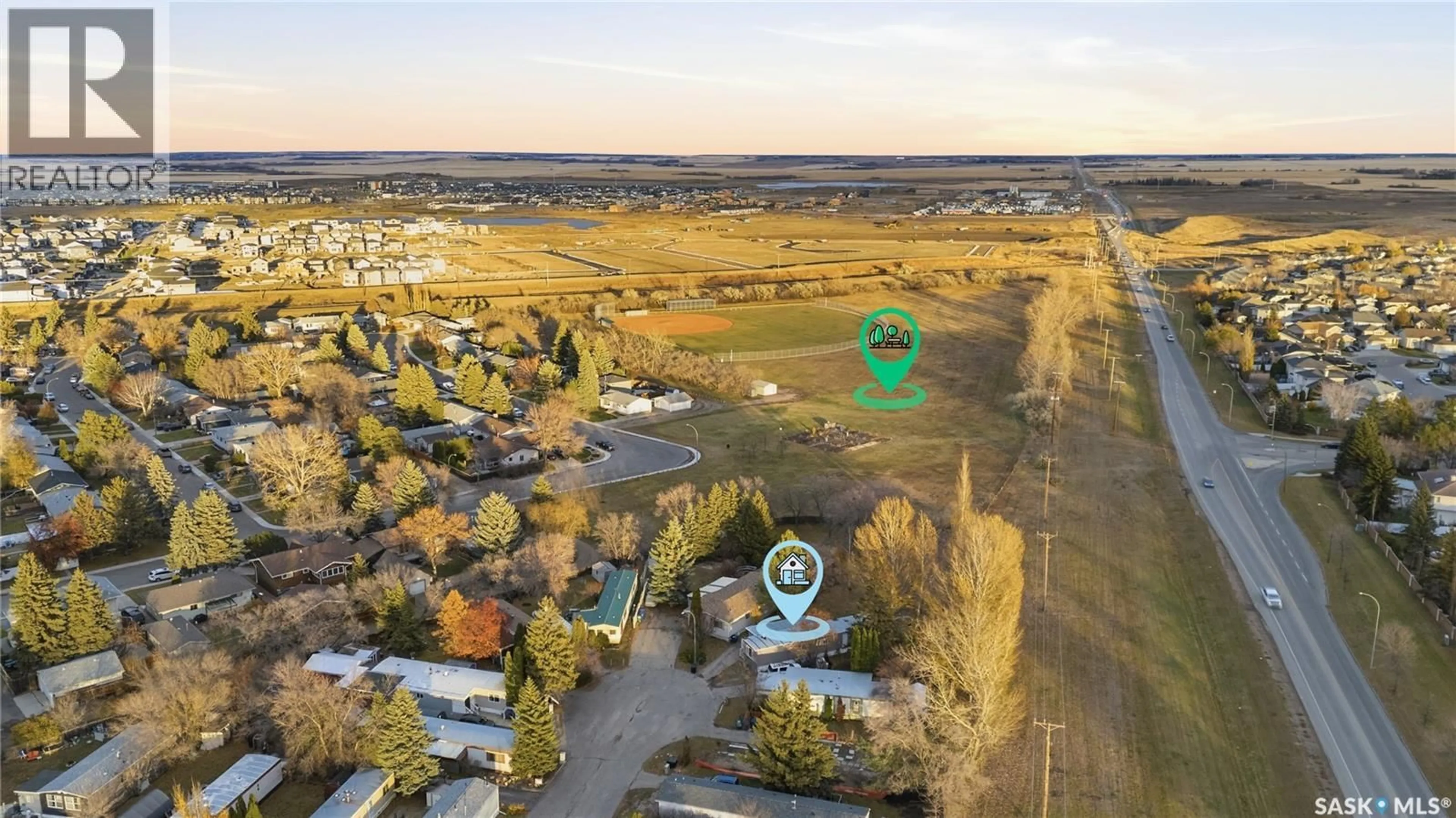 A pic from outside/outdoor area/front of a property/back of a property/a pic from drone, water/lake/river/ocean view for 60 1035 BOYCHUK DRIVE, Saskatoon Saskatchewan S7H5B2