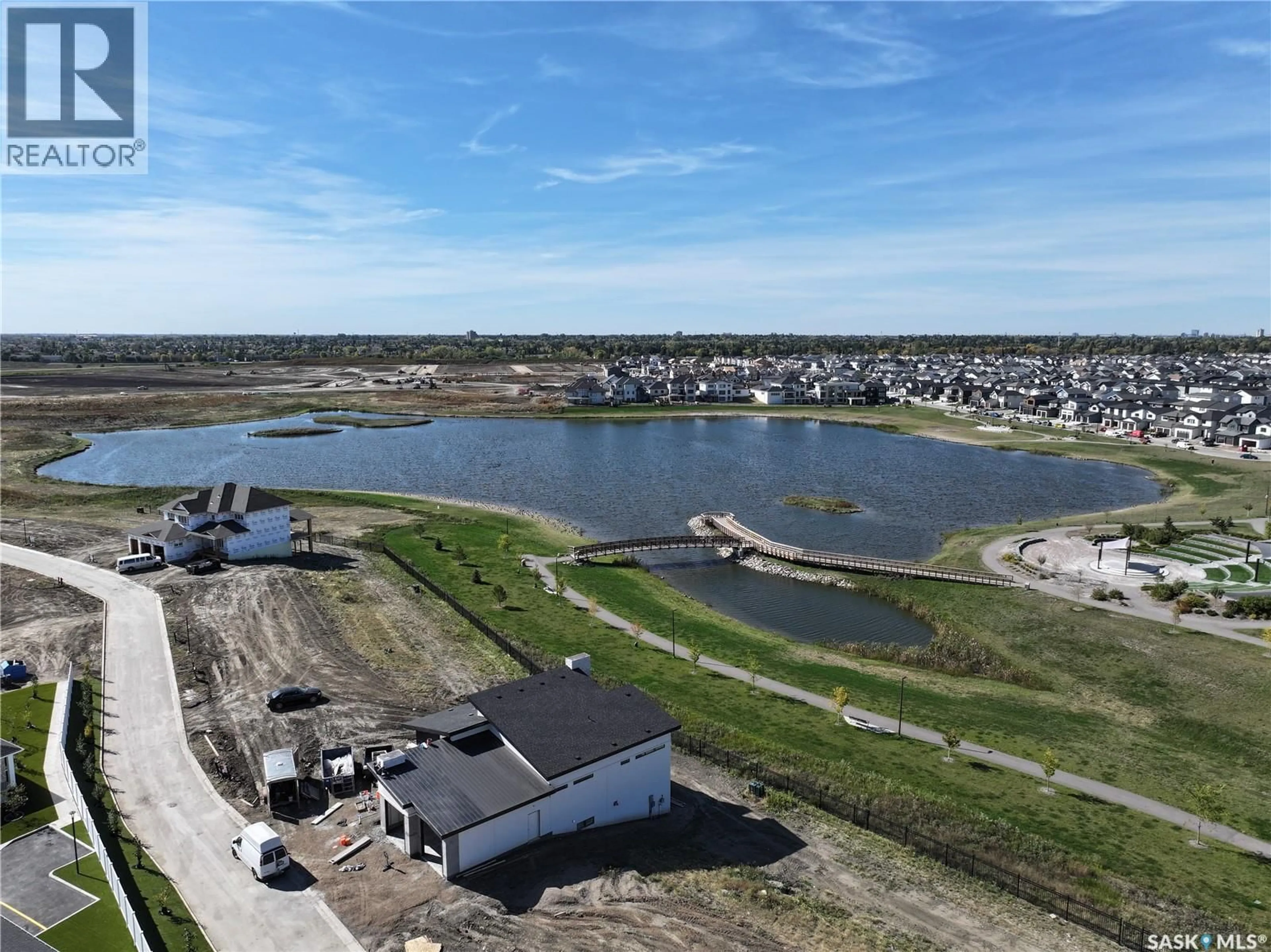 A pic from outside/outdoor area/front of a property/back of a property/a pic from drone, water/lake/river/ocean view for 710 - 108 BRIGHTON BOULEVARD, Saskatoon Saskatchewan S7V0R3