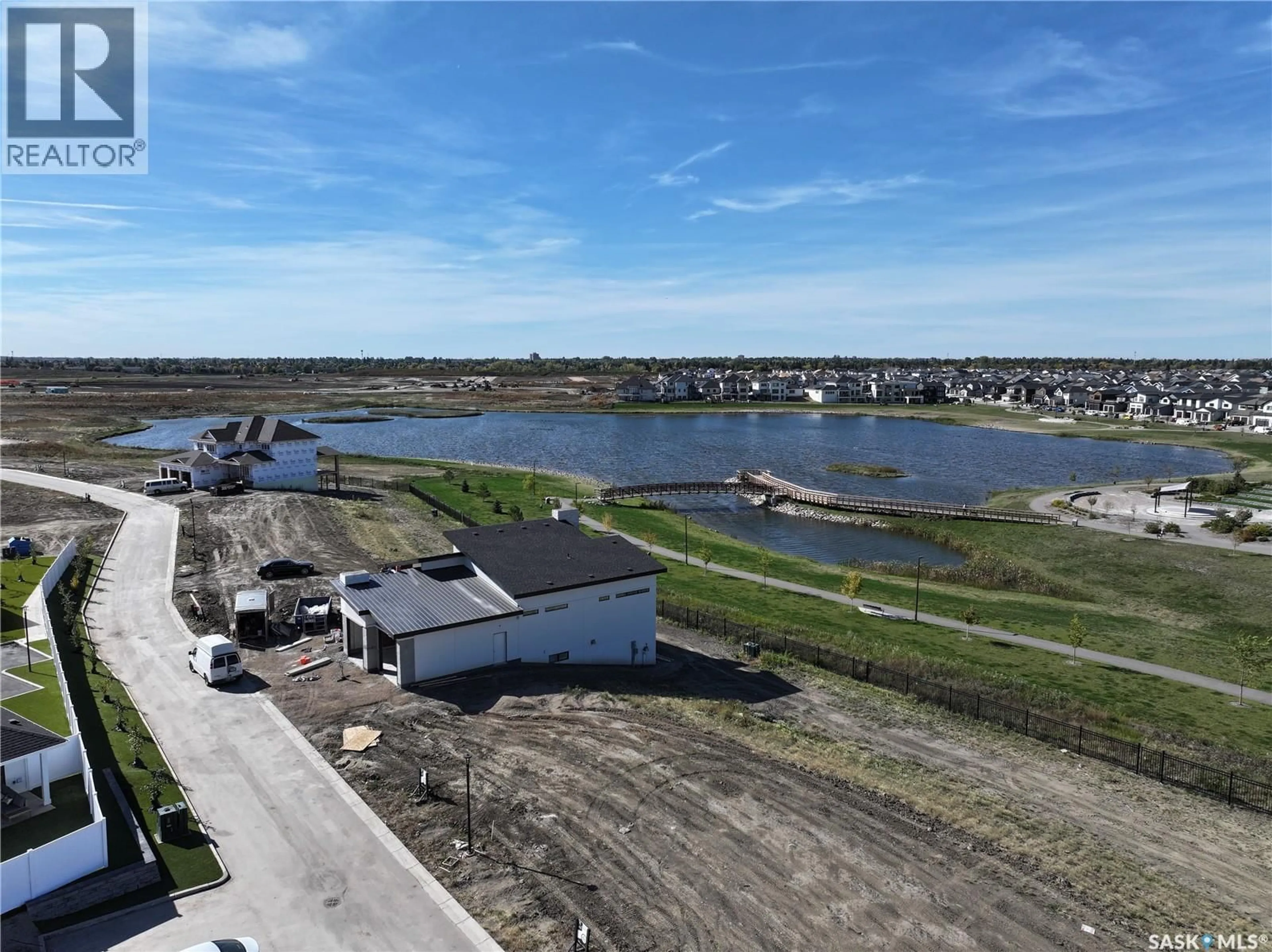 A pic from outside/outdoor area/front of a property/back of a property/a pic from drone, water/lake/river/ocean view for 710 - 108 BRIGHTON BOULEVARD, Saskatoon Saskatchewan S7V0R3