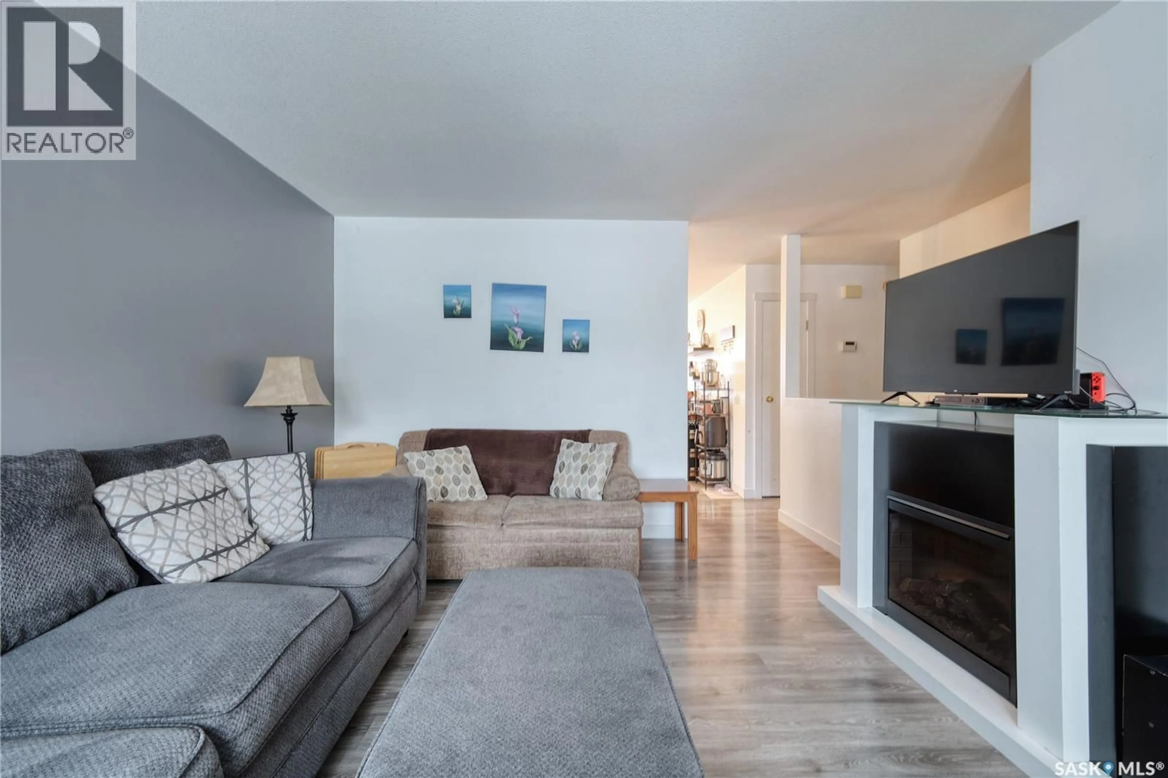 Living room with furniture, unknown for 313 CENTENNIAL BOULEVARD, Warman Saskatchewan S0K4S0