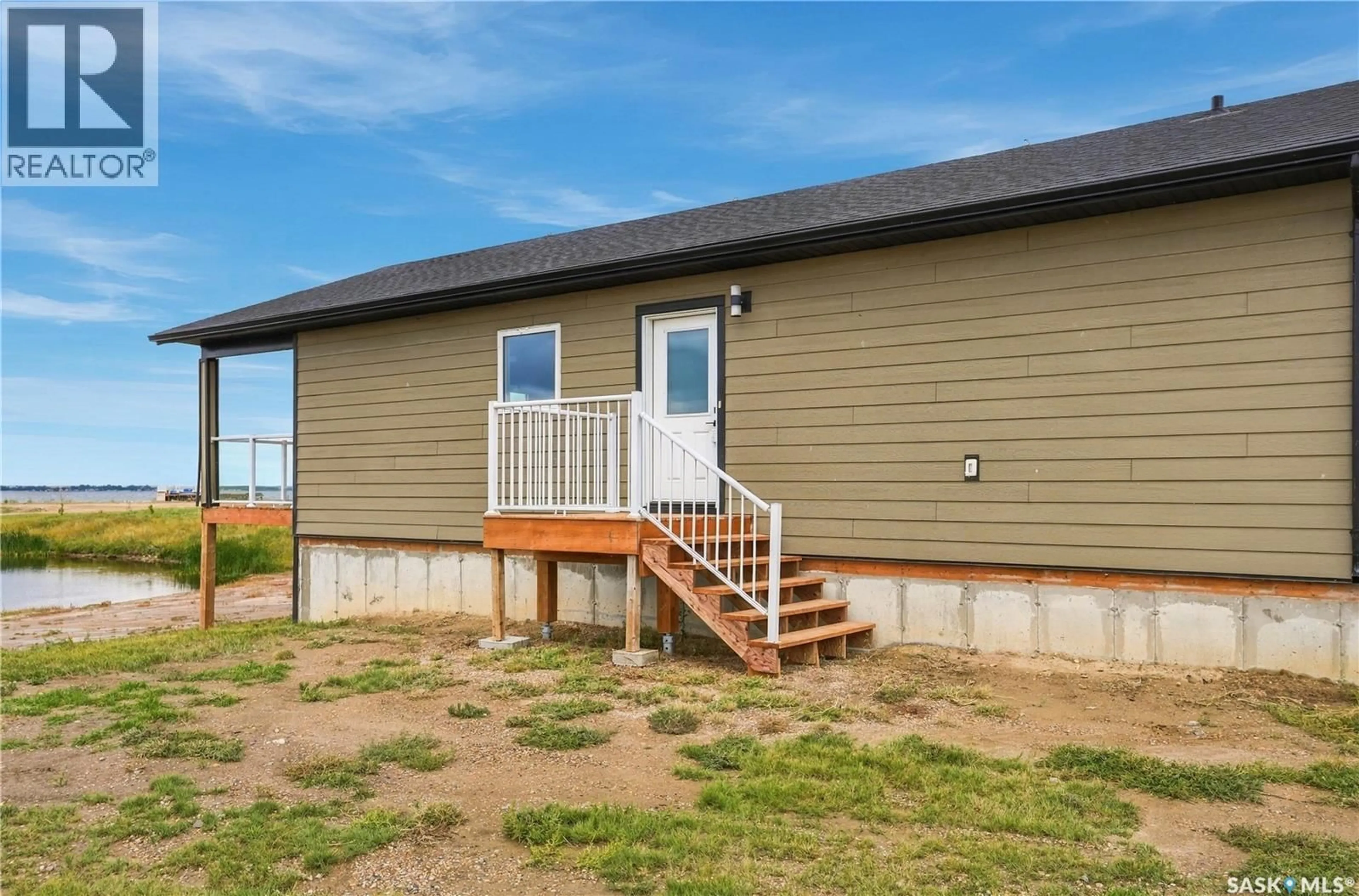 Home with vinyl exterior material, building for 78 SUNSET ACRES ROAD, Last Mountain Lake East Side Saskatchewan S0G0Z0