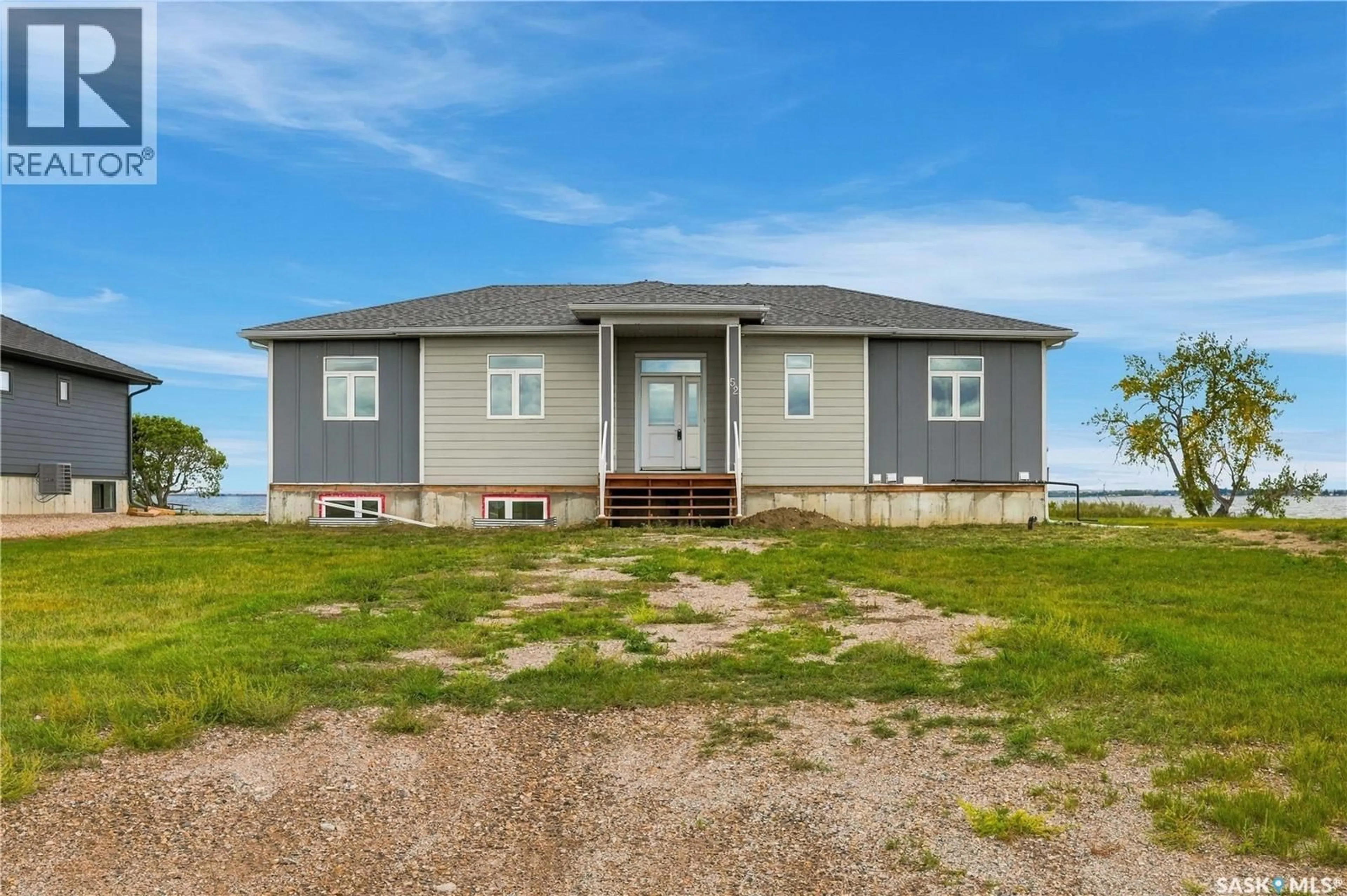 Home with vinyl exterior material, building for 52 SUNSET ACRES LANE, Last Mountain Lake East Side Saskatchewan S0G0Z0