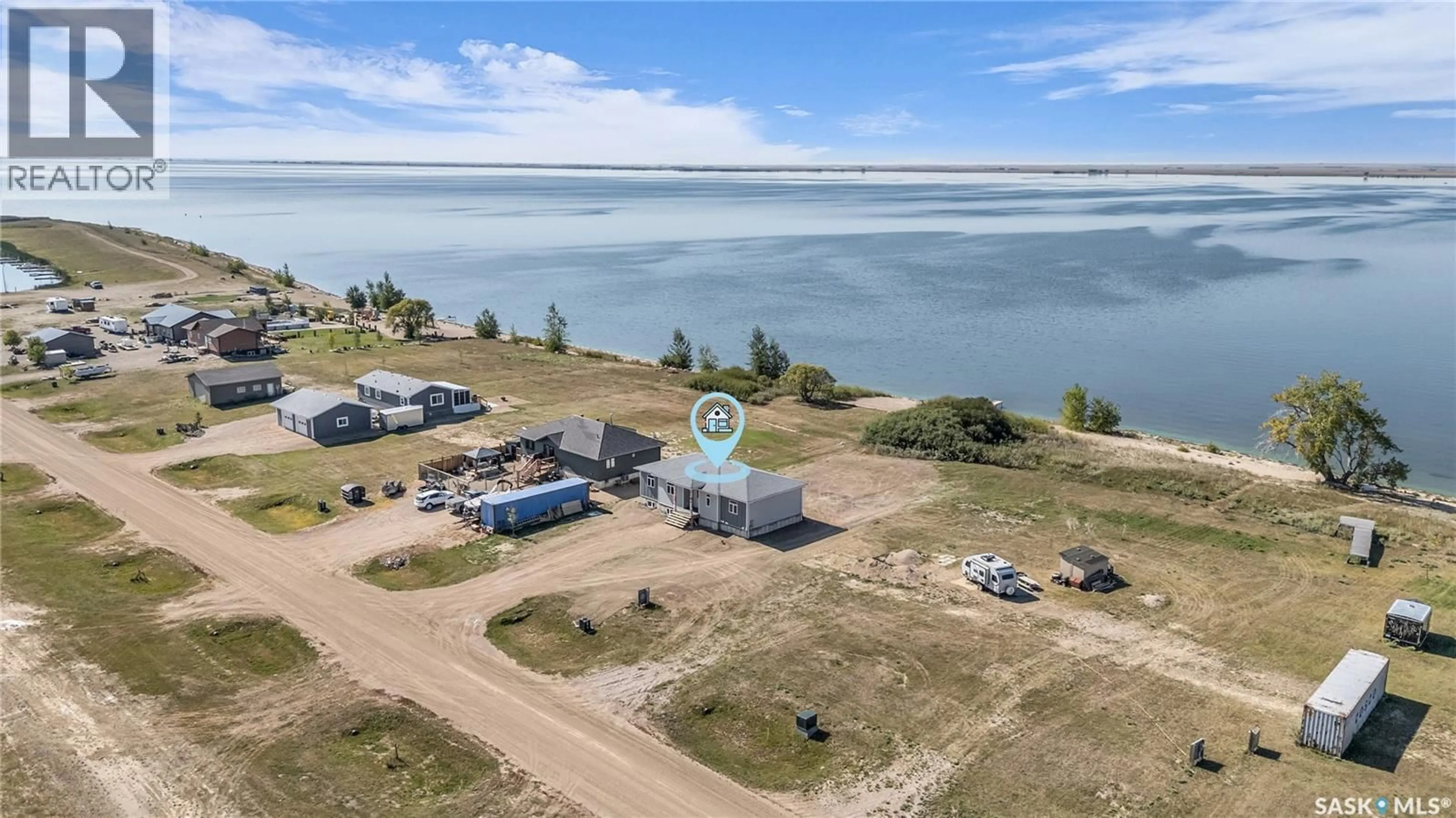 A pic from outside/outdoor area/front of a property/back of a property/a pic from drone, water/lake/river/ocean view for 52 SUNSET ACRES LANE, Last Mountain Lake East Side Saskatchewan S0G0Z0