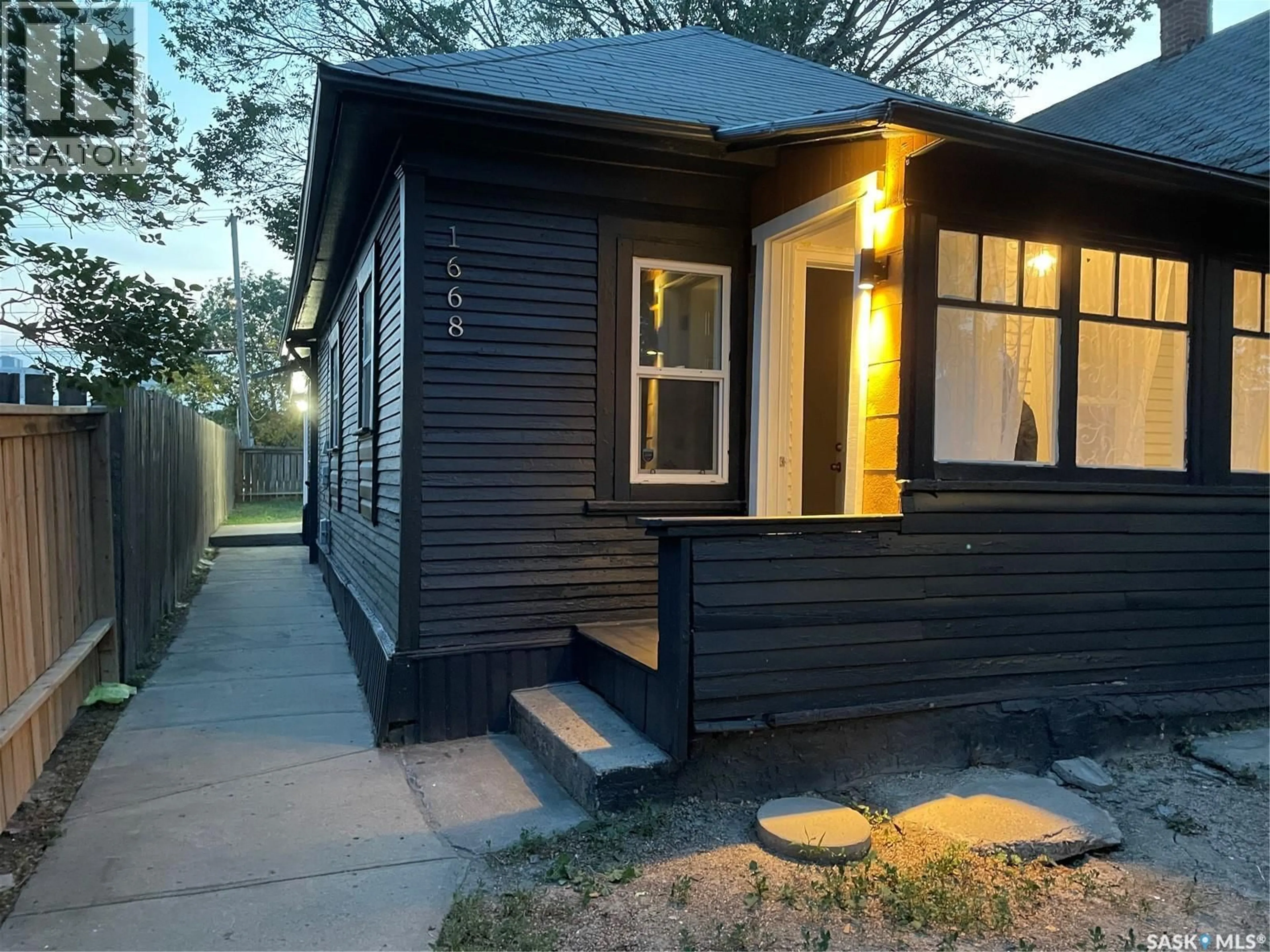 Home with vinyl exterior material, street for 1668 OTTAWA STREET, Regina Saskatchewan S4P1N9