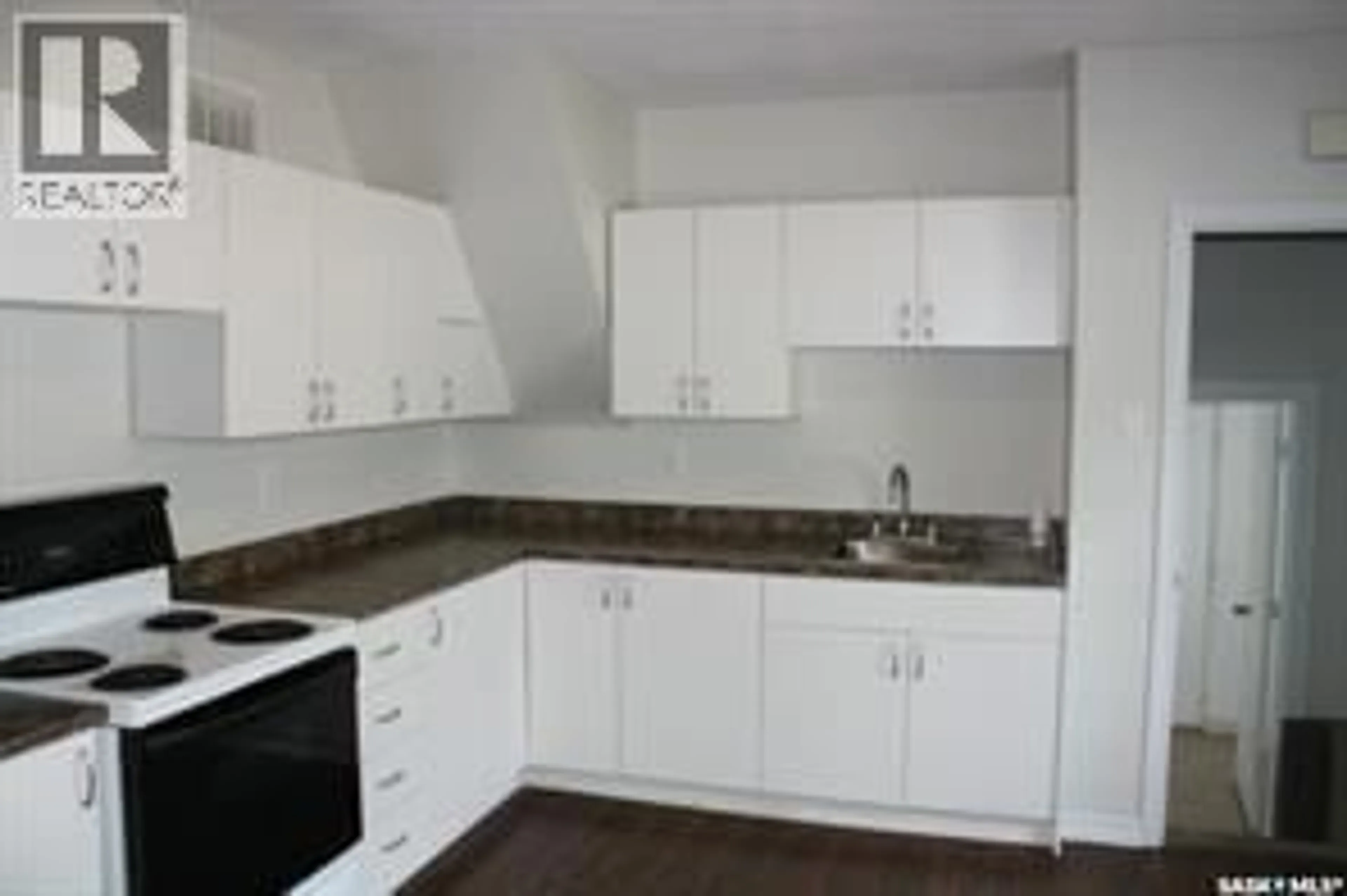 Standard kitchen, wood/laminate floor for 1111 23RD STREET, Saskatoon Saskatchewan S7L0A7