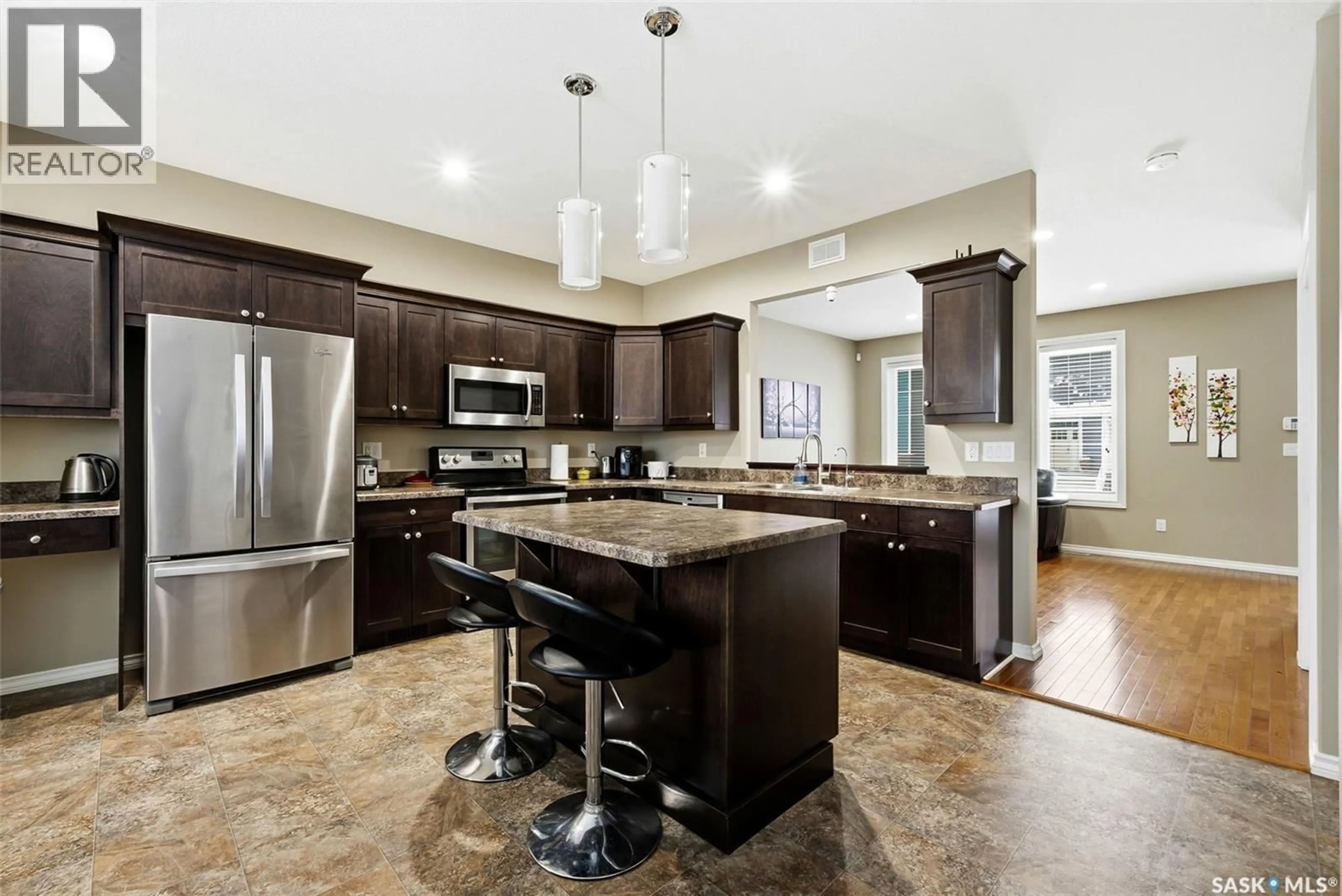 Open concept kitchen, ceramic/tile floor for 1122 JURASIN STREET, Regina Saskatchewan S4X0K1