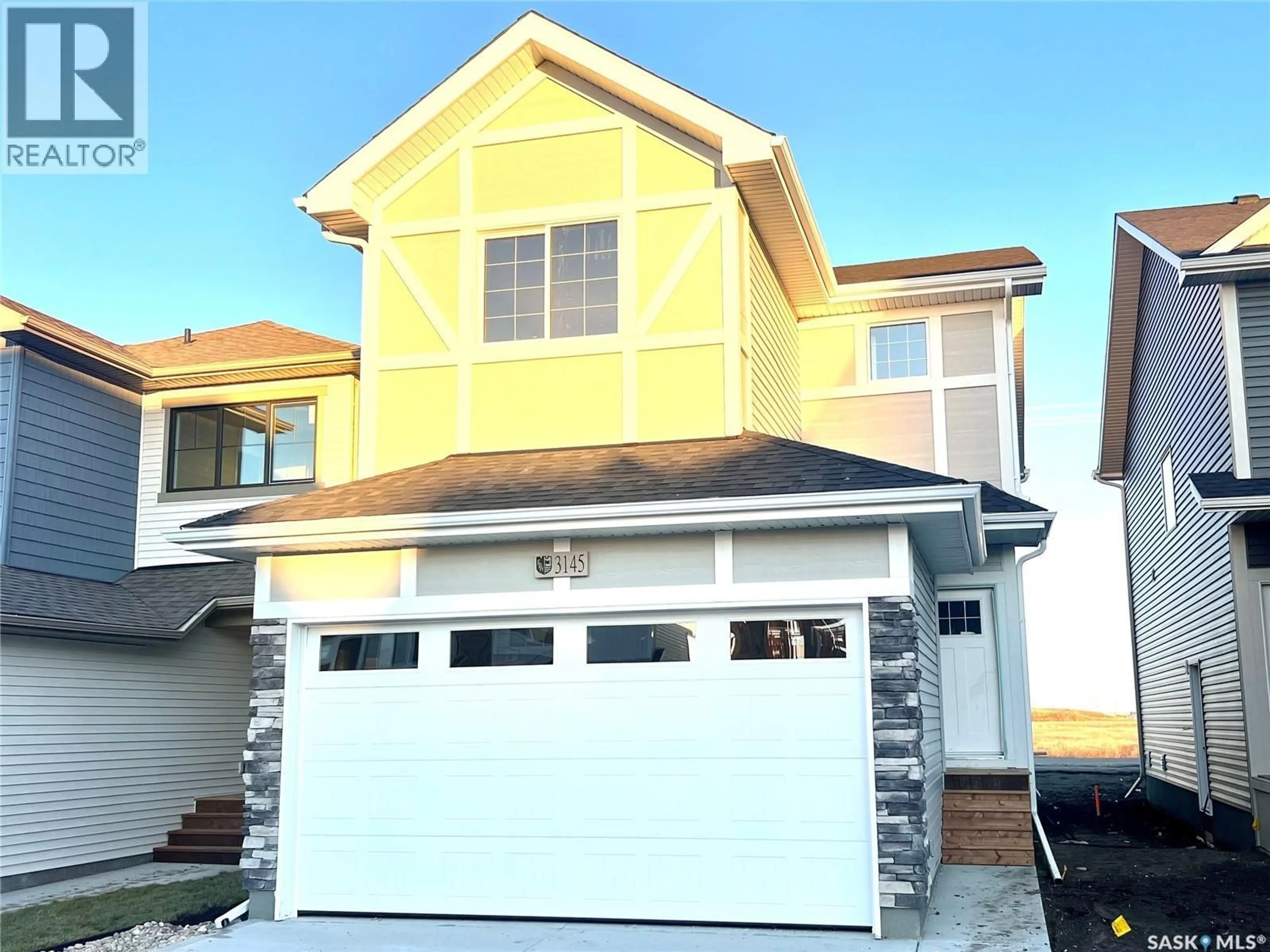 Home with vinyl exterior material, street for 3145 GREEN TURTLE ROAD, Regina Saskatchewan S4V4C5