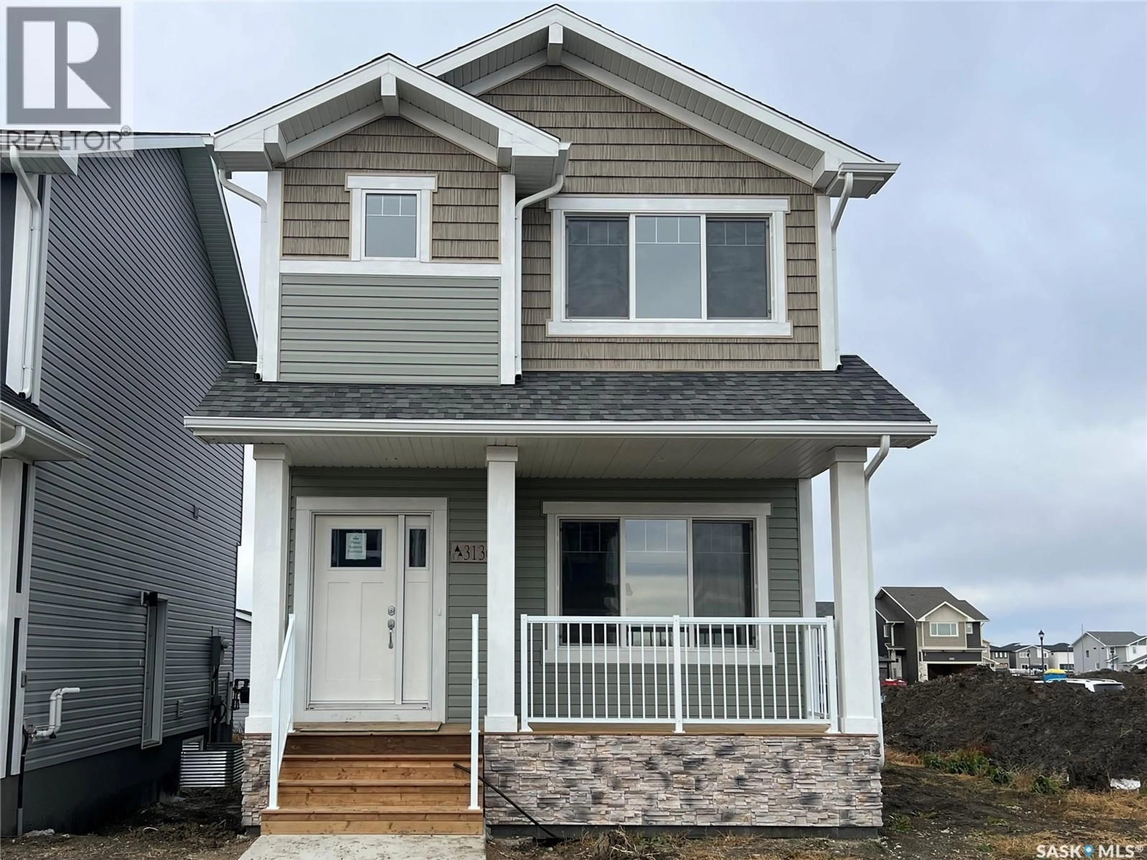 Home with vinyl exterior material, street for 3136 GREEN TURTLE ROAD, Regina Saskatchewan S4N7K9