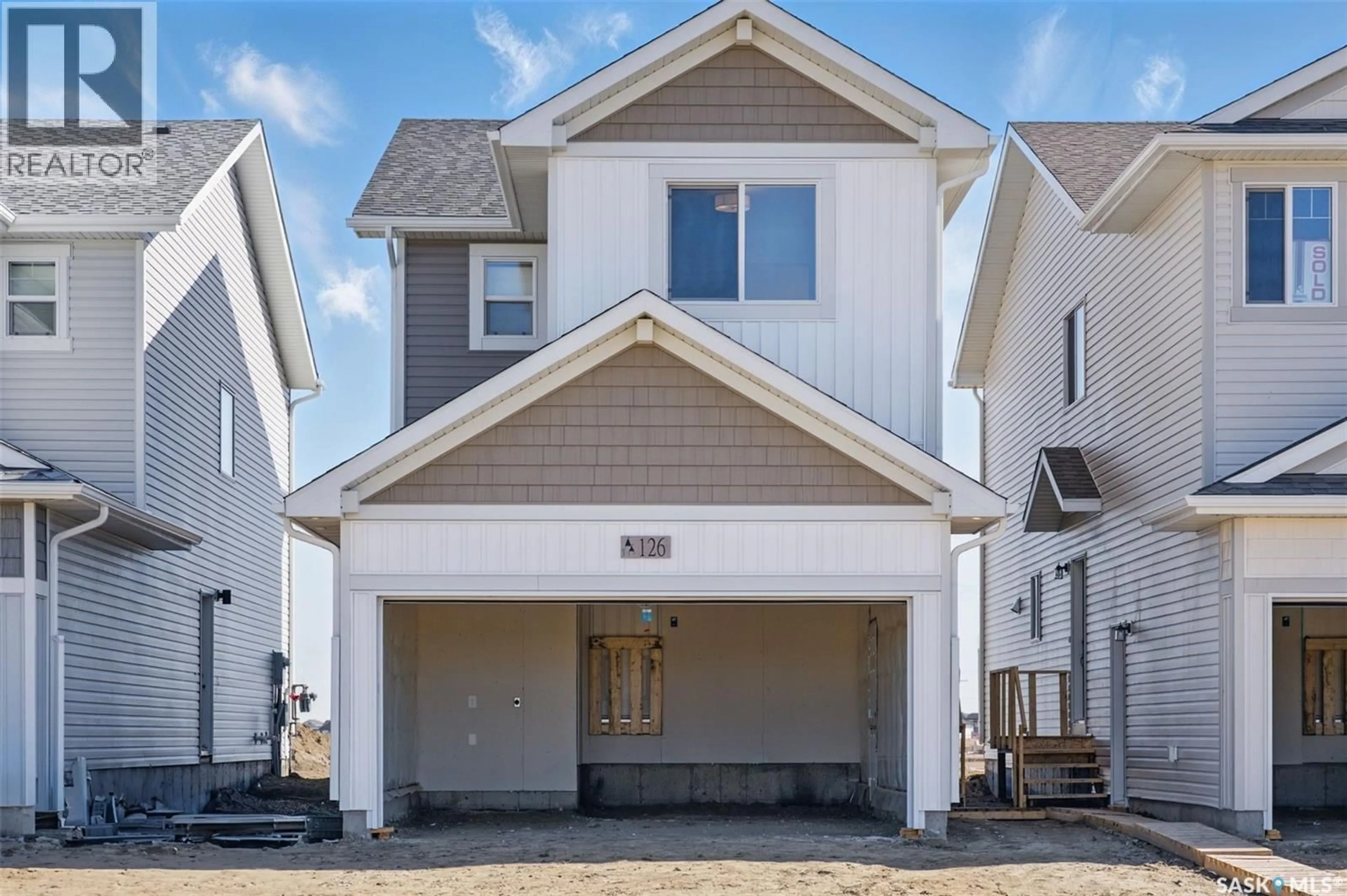 Home with vinyl exterior material, street for 222 ANTONINI COURT, Saskatoon Saskatchewan S7L7P2