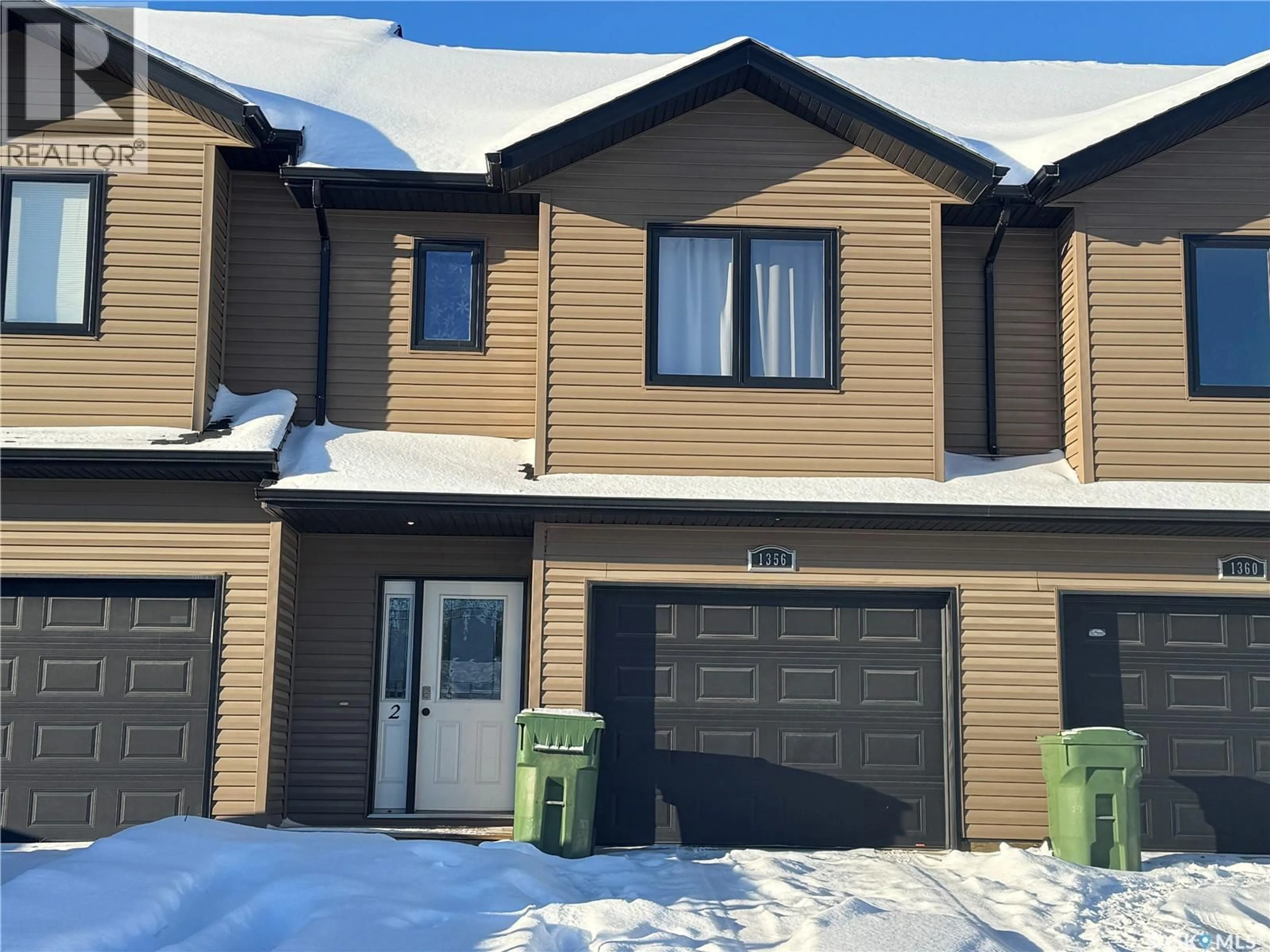 Home with vinyl exterior material, street for 2 356 STUDER STREET, La Ronge Saskatchewan S0J1L0