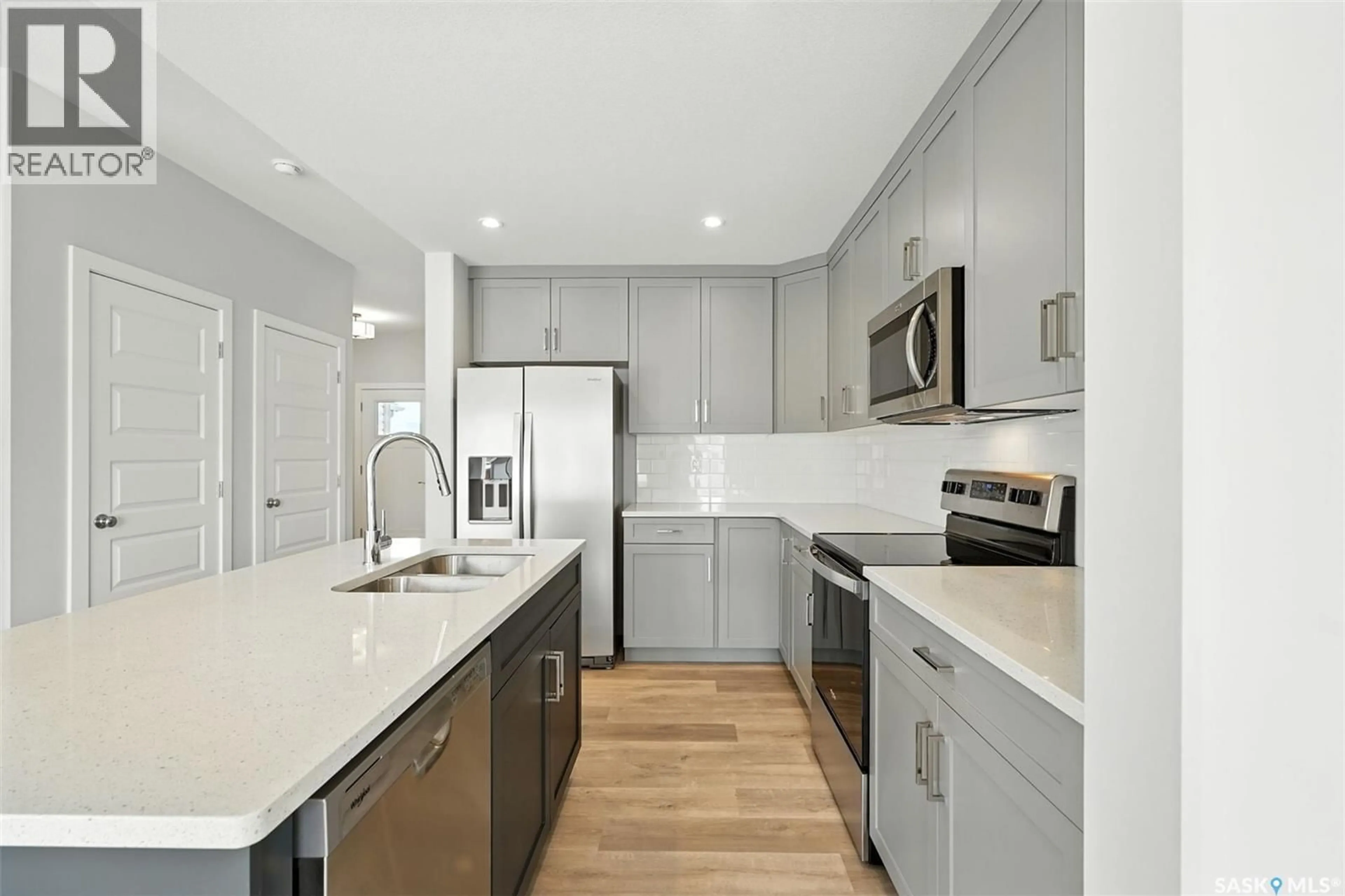 Open concept kitchen, ceramic/tile floor for 532 MYLES HEIDT MANOR, Saskatoon Saskatchewan S7W0Z4