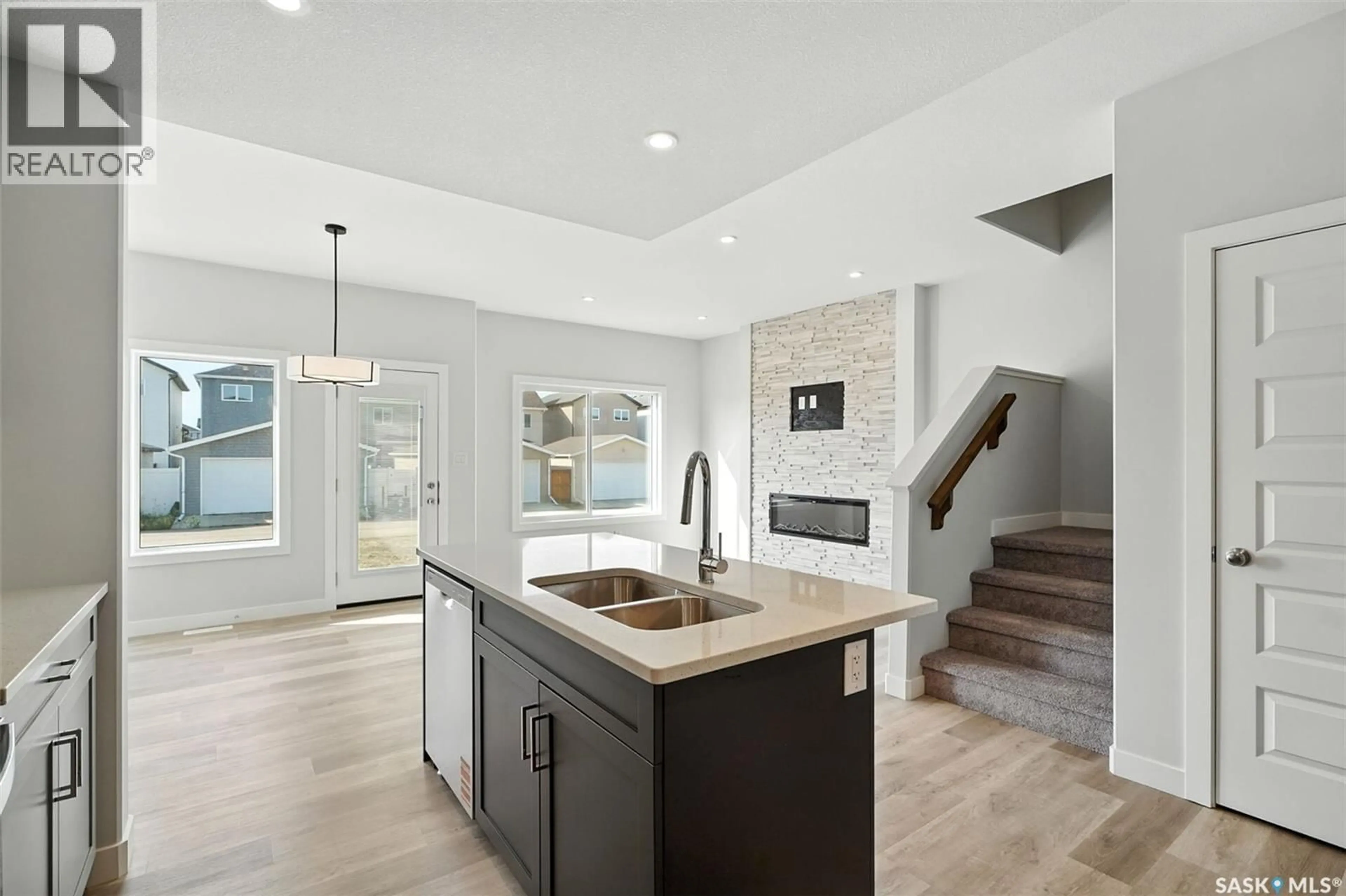 Open concept kitchen, ceramic/tile floor for 532 MYLES HEIDT MANOR, Saskatoon Saskatchewan S7W0Z4
