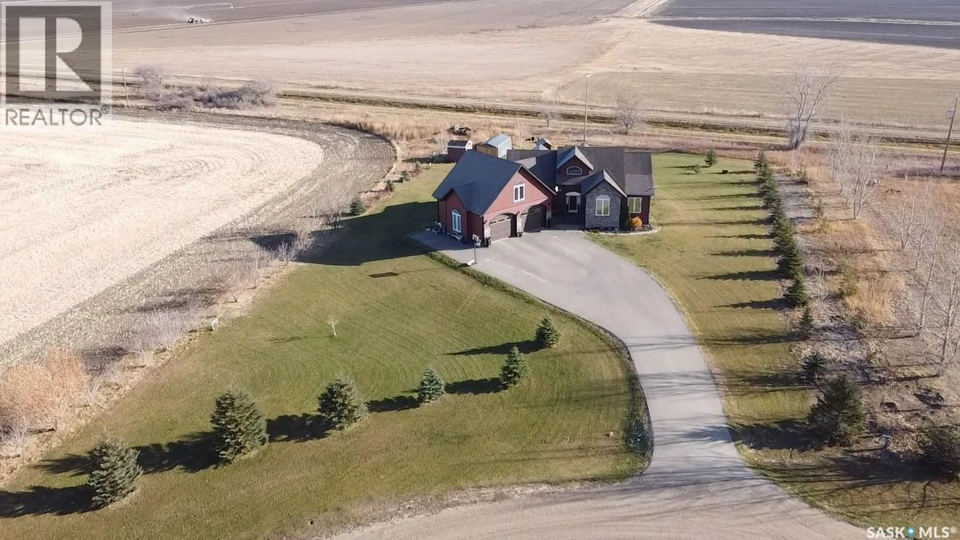 A pic from outside/outdoor area/front of a property/back of a property/a pic from drone, street for 219 CARRIAGE DRIVE, Rudy Rm No. 284 Saskatchewan S0L2N0