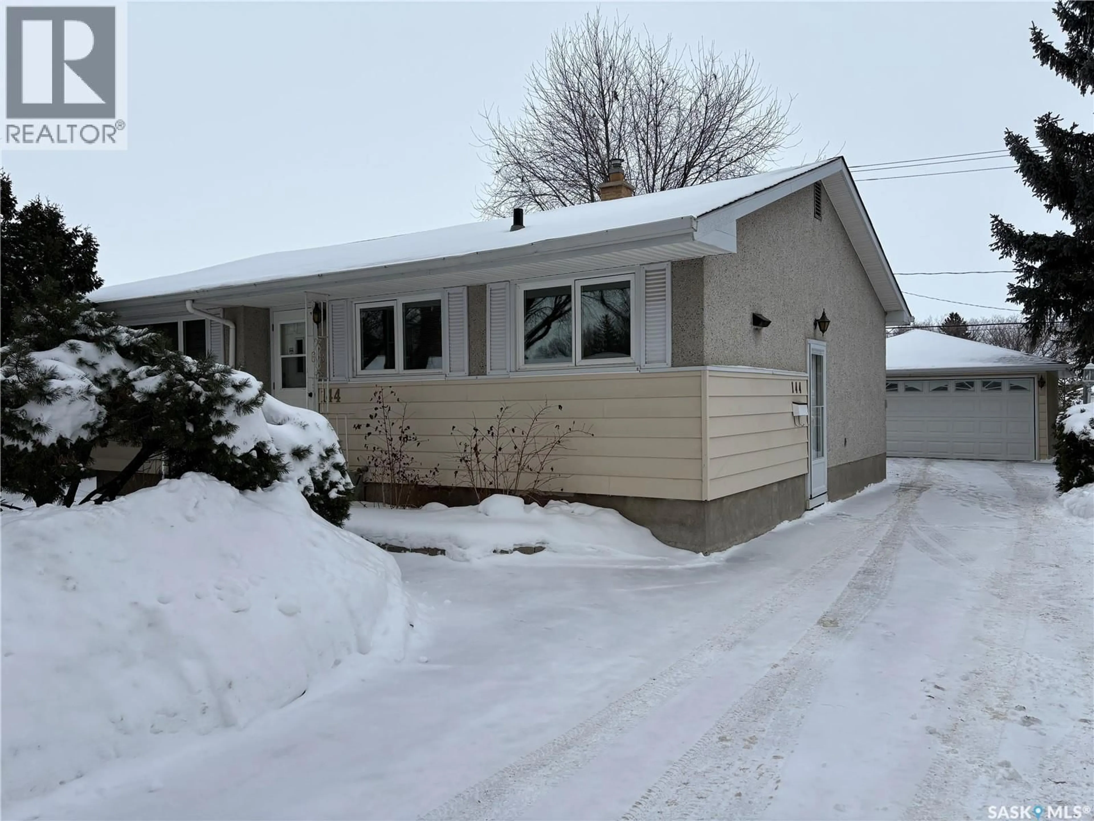 Home with vinyl exterior material, street for 144 WOODWARD AVENUE, Regina Saskatchewan S4R3H4