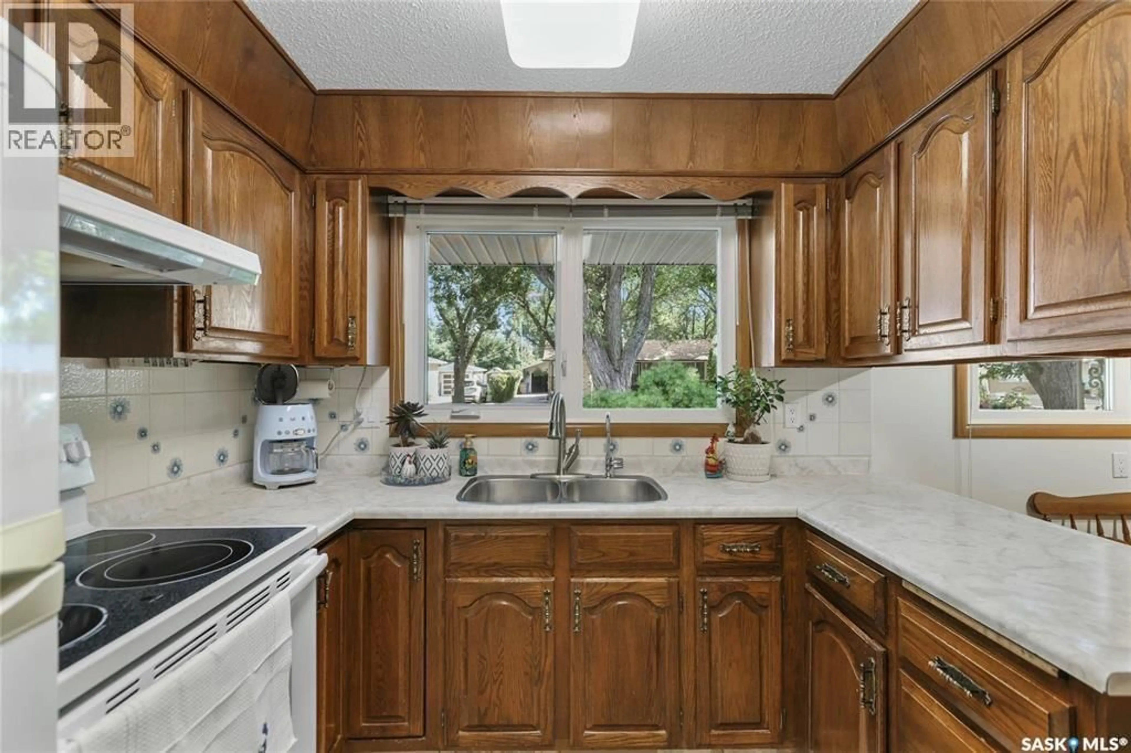 Standard kitchen, ceramic/tile floor for 144 WOODWARD AVENUE, Regina Saskatchewan S4R3H4