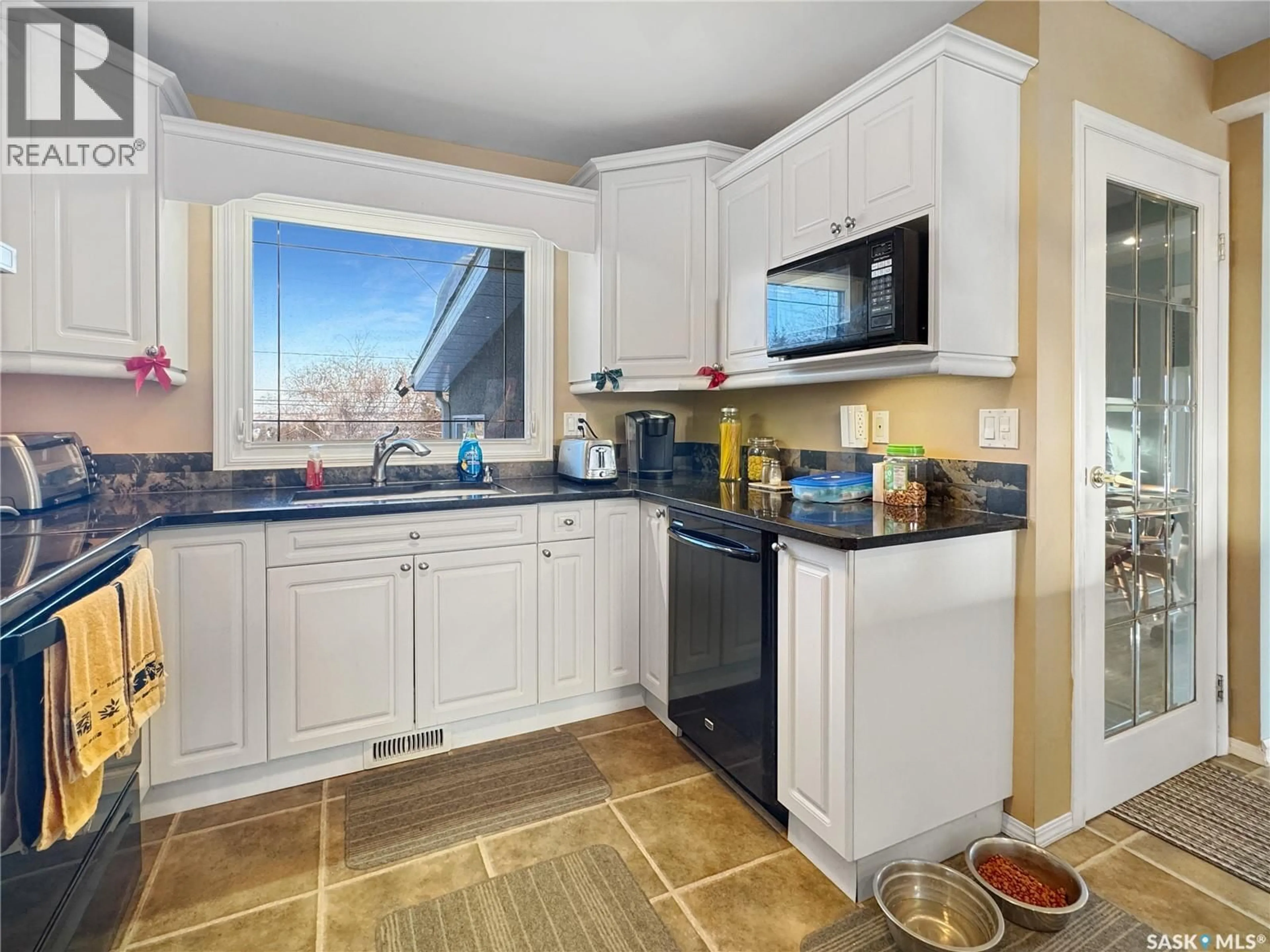 Open concept kitchen, ceramic/tile floor for 222 32ND STREET, Battleford Saskatchewan S0M0E0