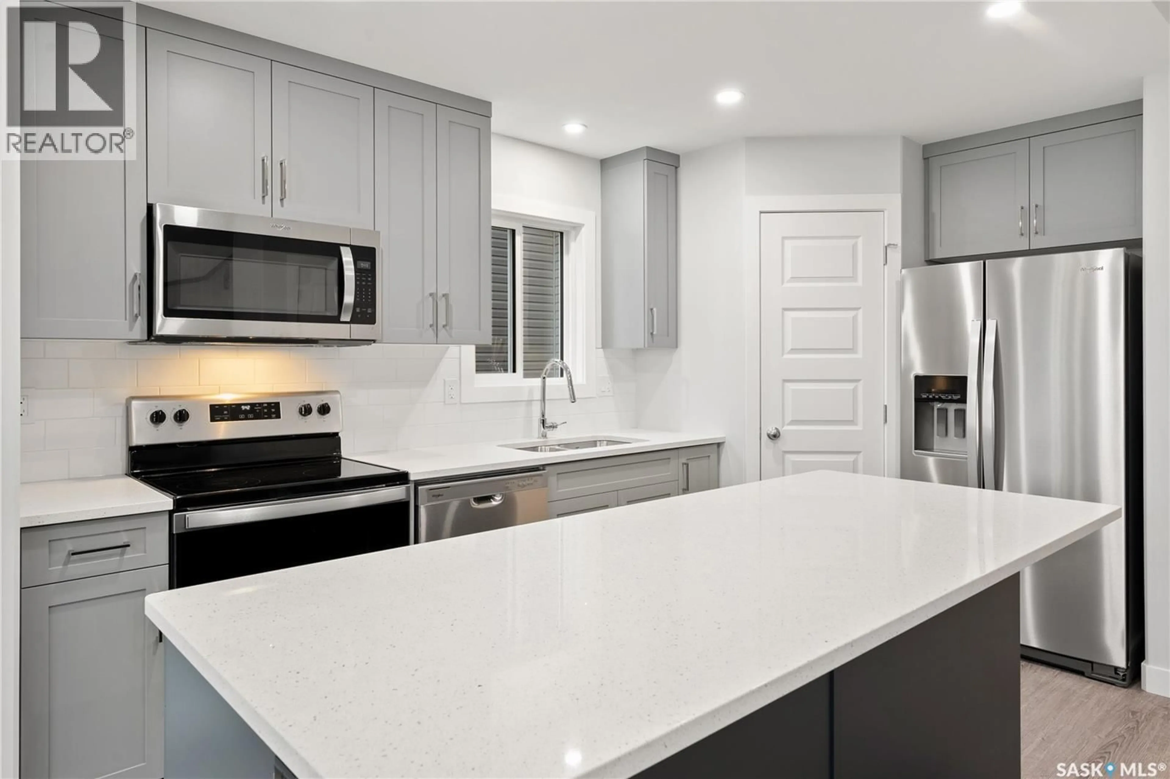 Open concept kitchen, ceramic/tile floor for 218 KOSTIUK CRESCENT, Saskatoon Saskatchewan S7V2A2