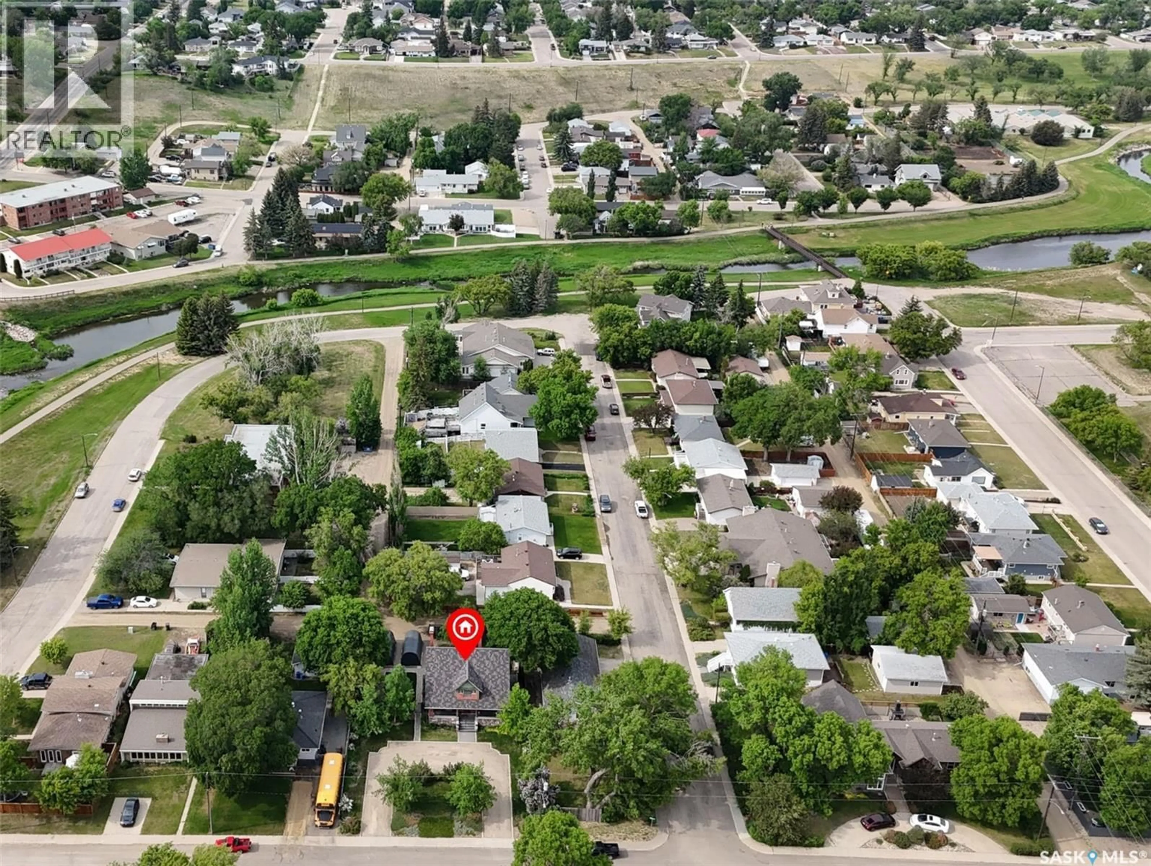 A pic from outside/outdoor area/front of a property/back of a property/a pic from drone, street for 735 SIDNEY STREET, Swift Current Saskatchewan S9H1T5