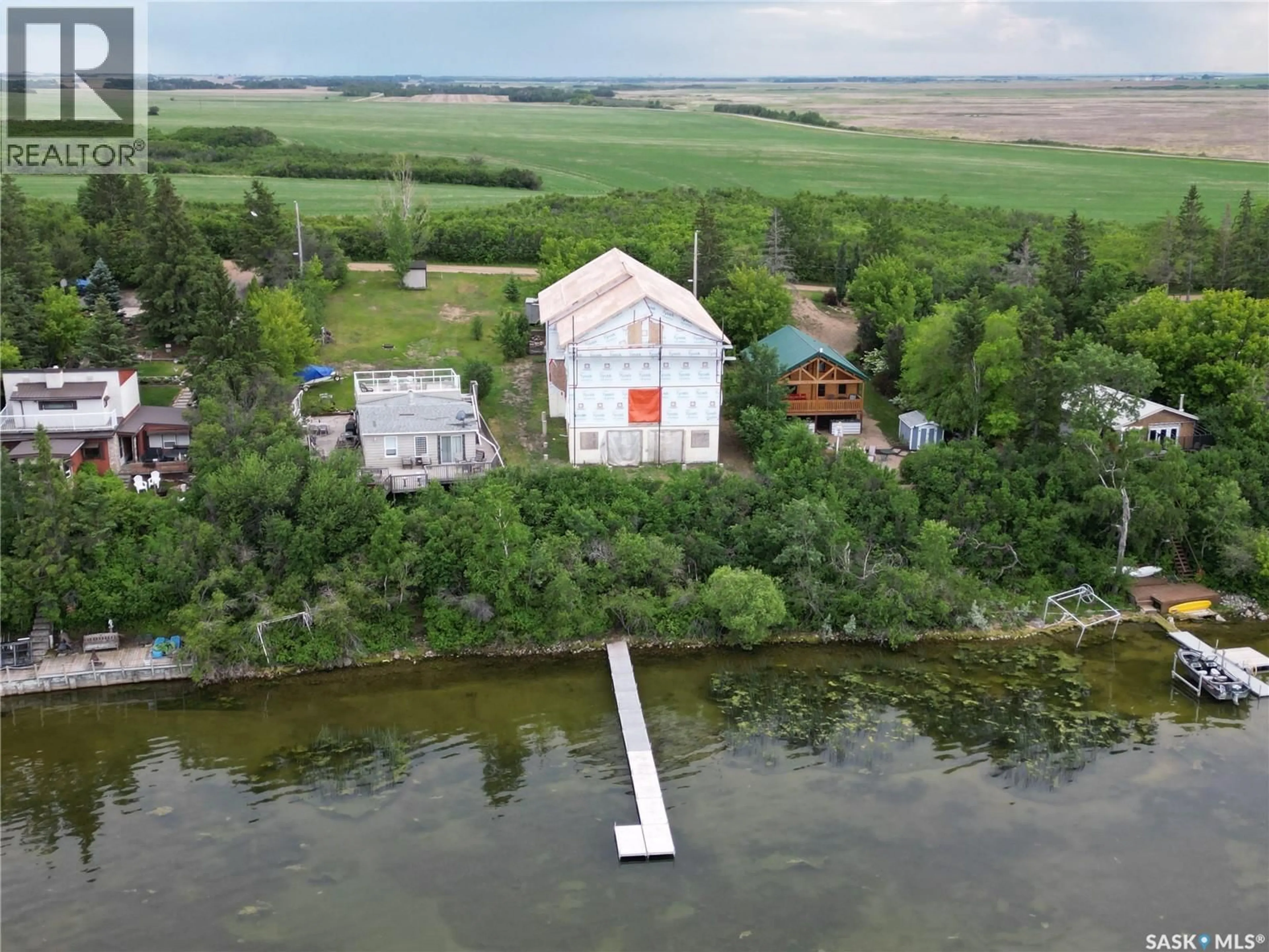 A pic from outside/outdoor area/front of a property/back of a property/a pic from drone, water/lake/river/ocean view for 24 ELDRIDGE DRIVE, Meota Rm No.468 Saskatchewan S0M0L0