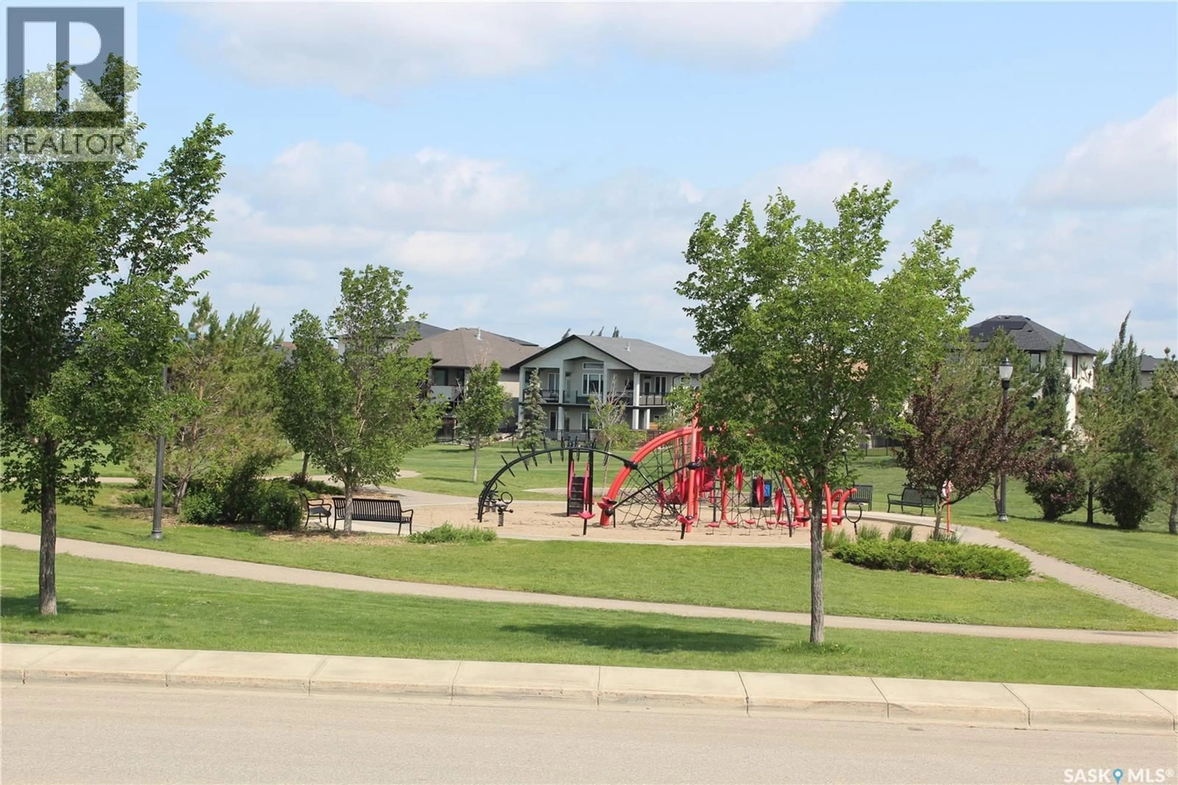 A pic from outside/outdoor area/front of a property/back of a property/a pic from drone, street for E - 4337 GREEN APPLE DRIVE, Regina Saskatchewan S4V1R3