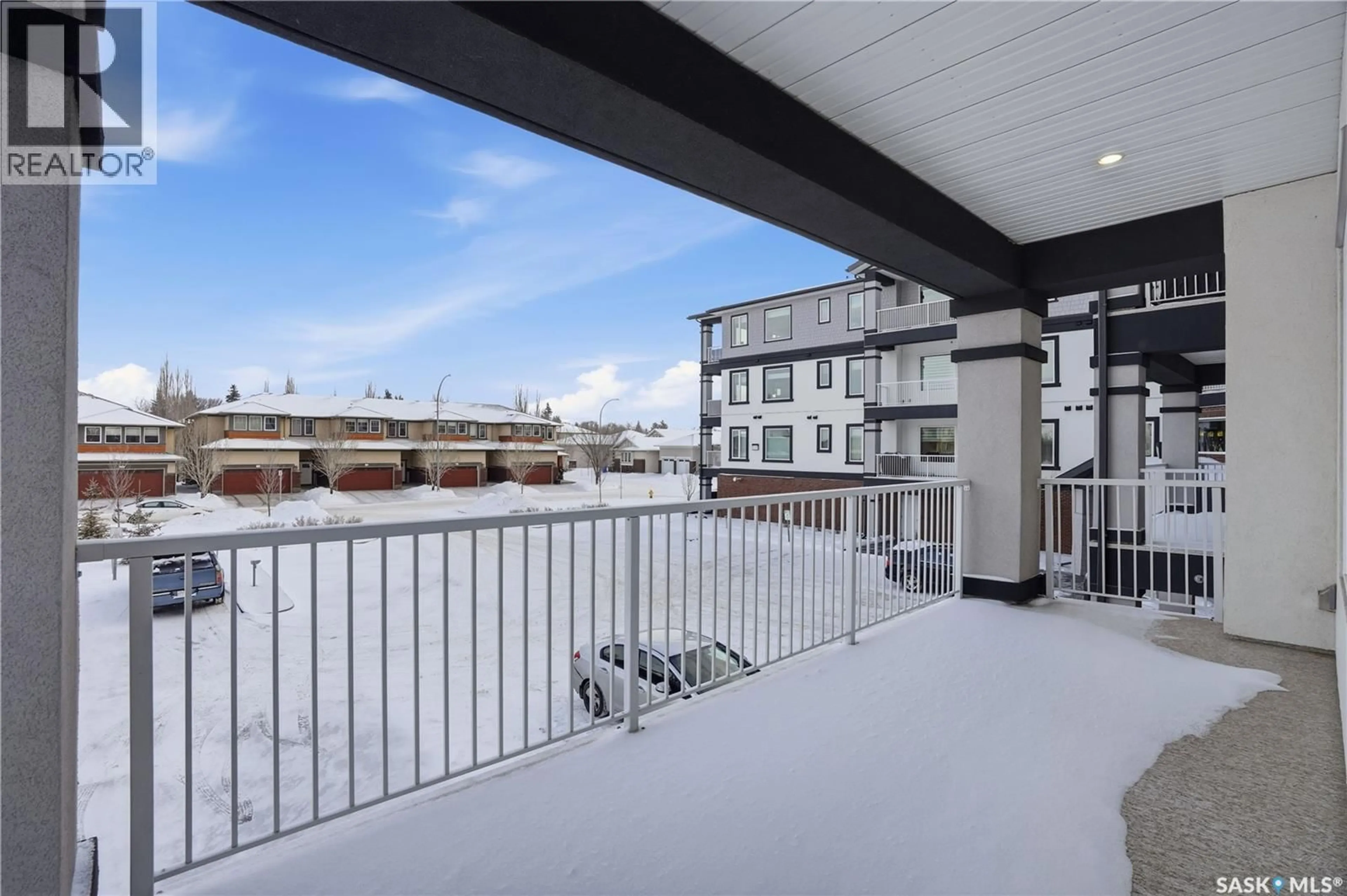 Patio, city buildings view from balcony for 3581 - 201 EVANS COURT, Regina Saskatchewan S4S7A3