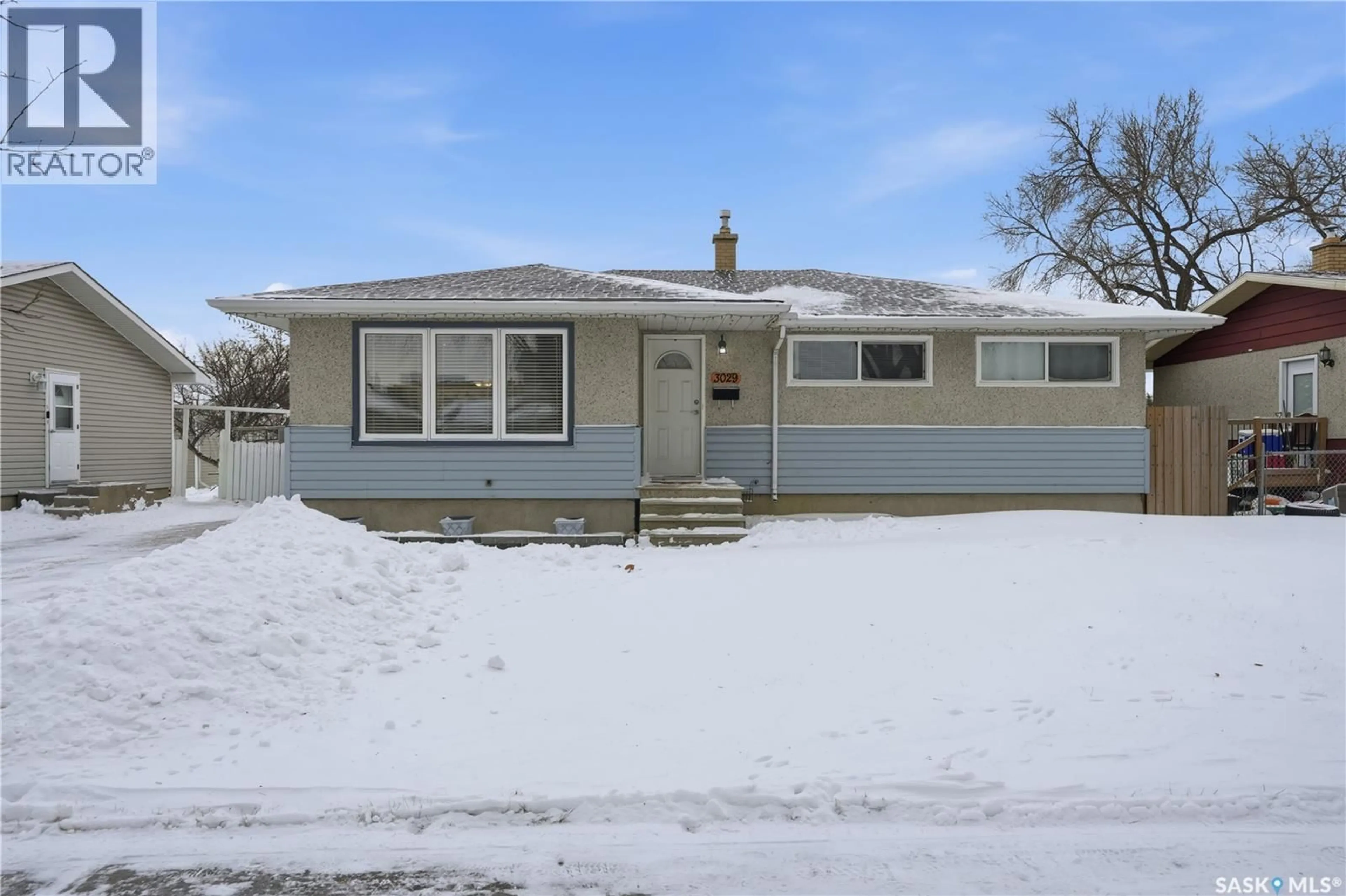 Home with vinyl exterior material, street for 3029 6TH AVENUE, Regina Saskatchewan S4R0P3