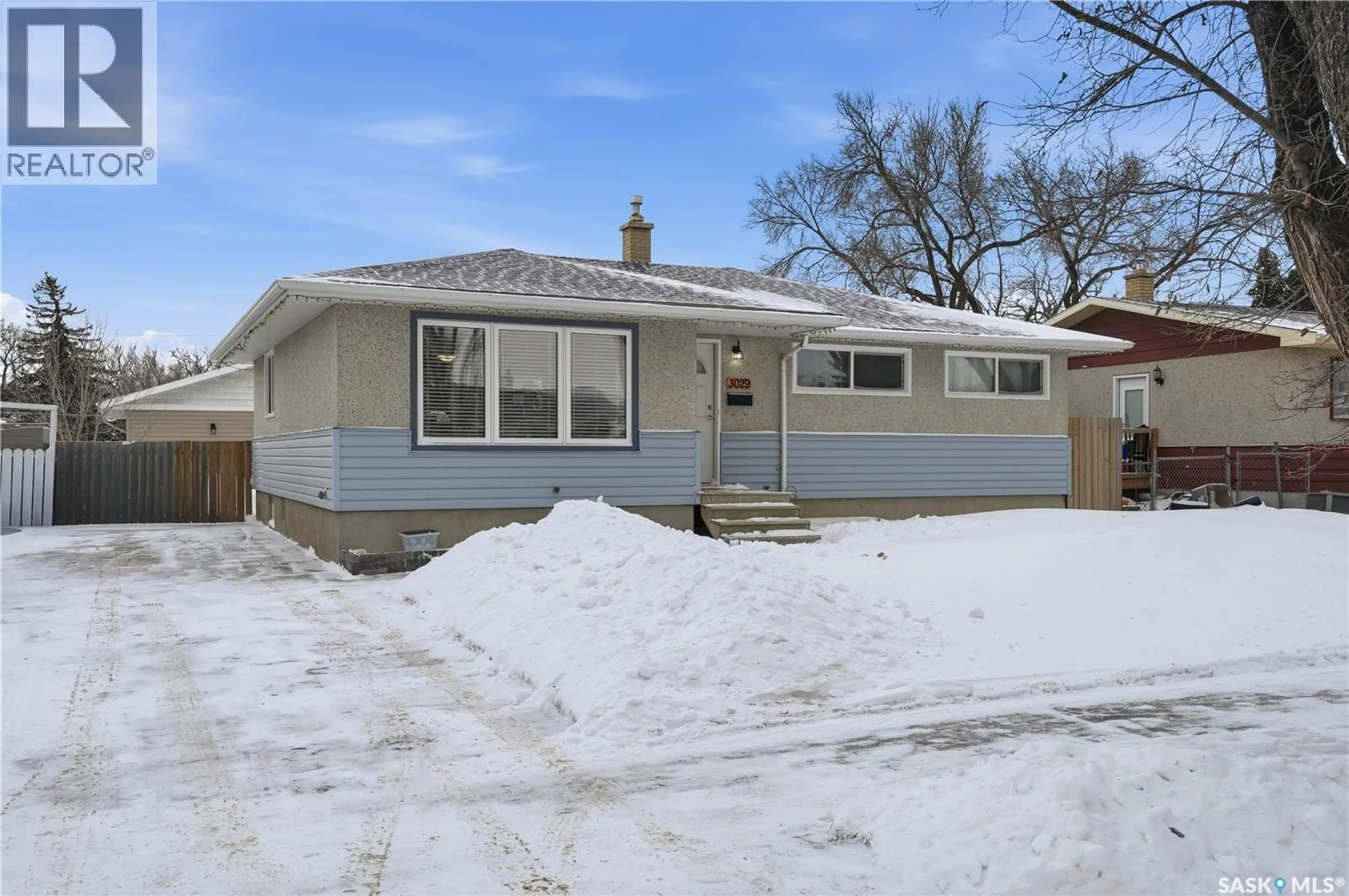 Home with vinyl exterior material, street for 3029 6TH AVENUE, Regina Saskatchewan S4R0P3
