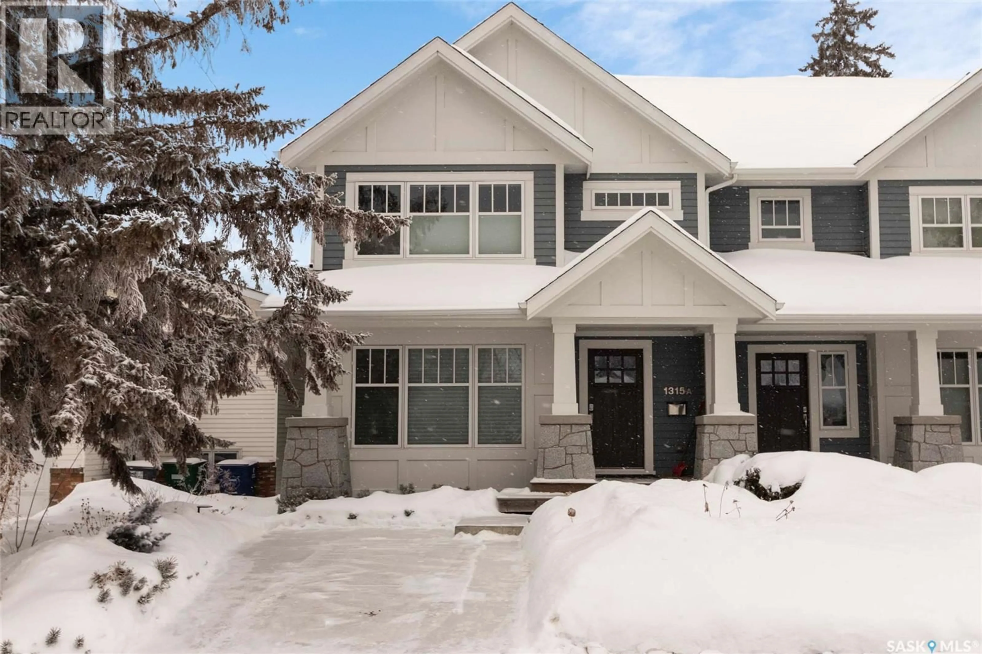 Home with vinyl exterior material, street for 1315A 11TH STREET, Saskatoon Saskatchewan S7H0G4