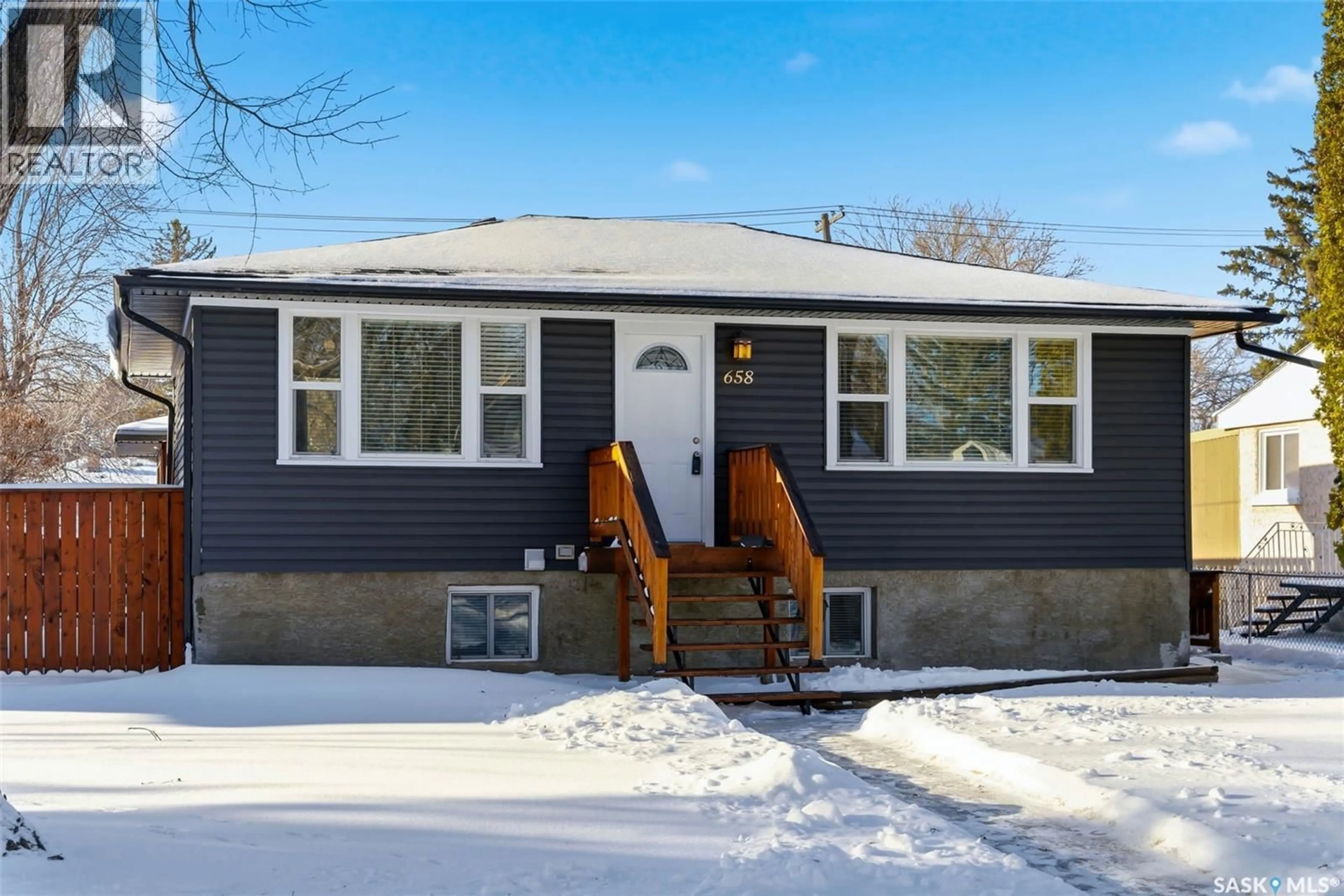 Home with vinyl exterior material, street for 658 PRINCESS STREET, Regina Saskatchewan S4T3X5