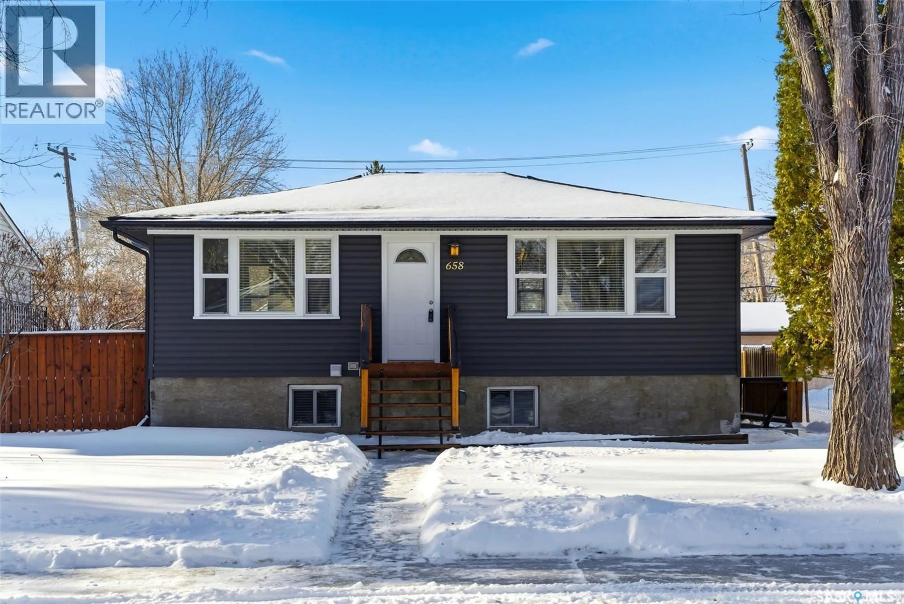Home with vinyl exterior material, street for 658 PRINCESS STREET, Regina Saskatchewan S4T3X5