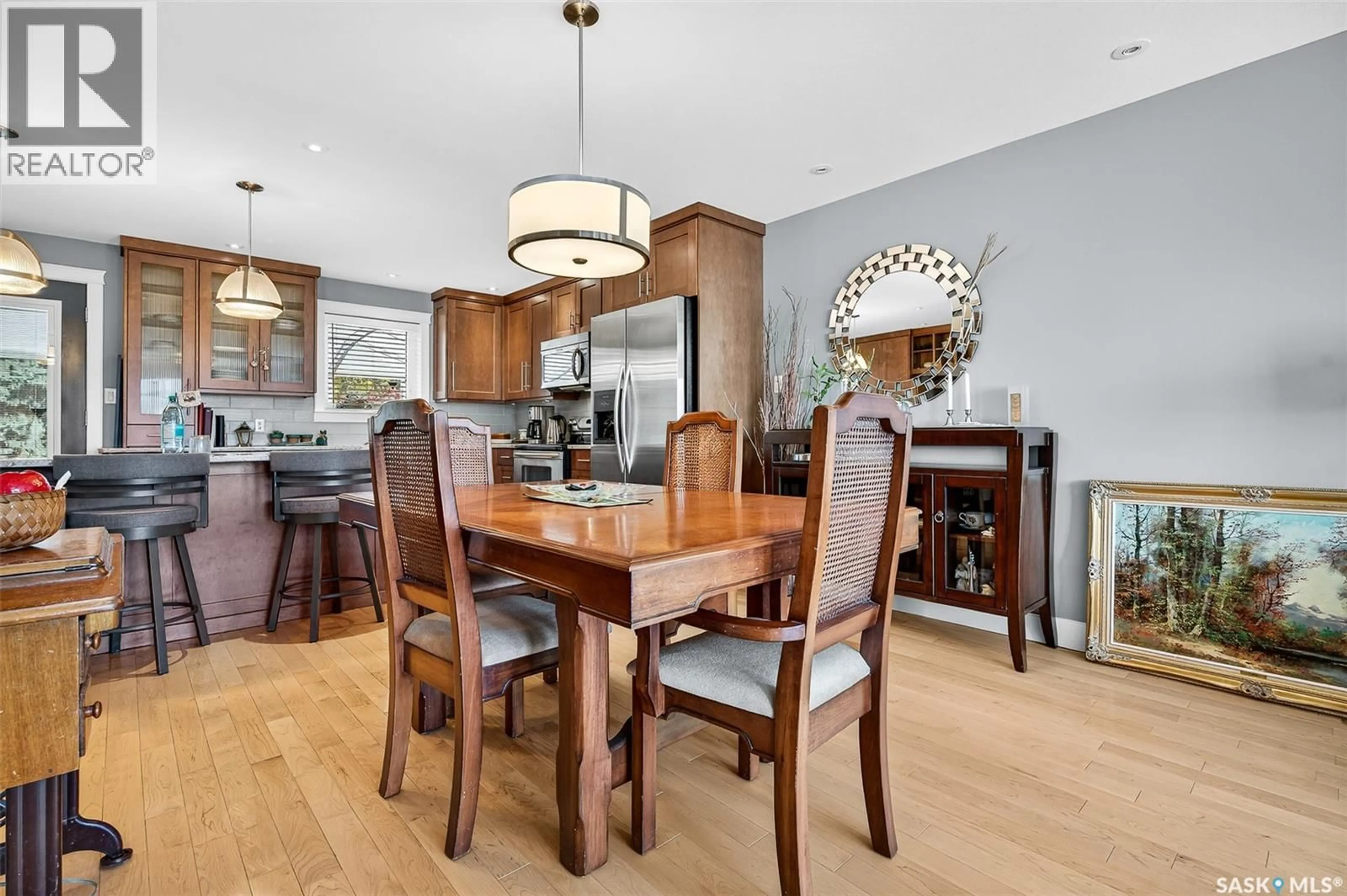 Dining room, wood/laminate floor for 133 WOOD LILY DRIVE, Moose Jaw Saskatchewan S6J1E9