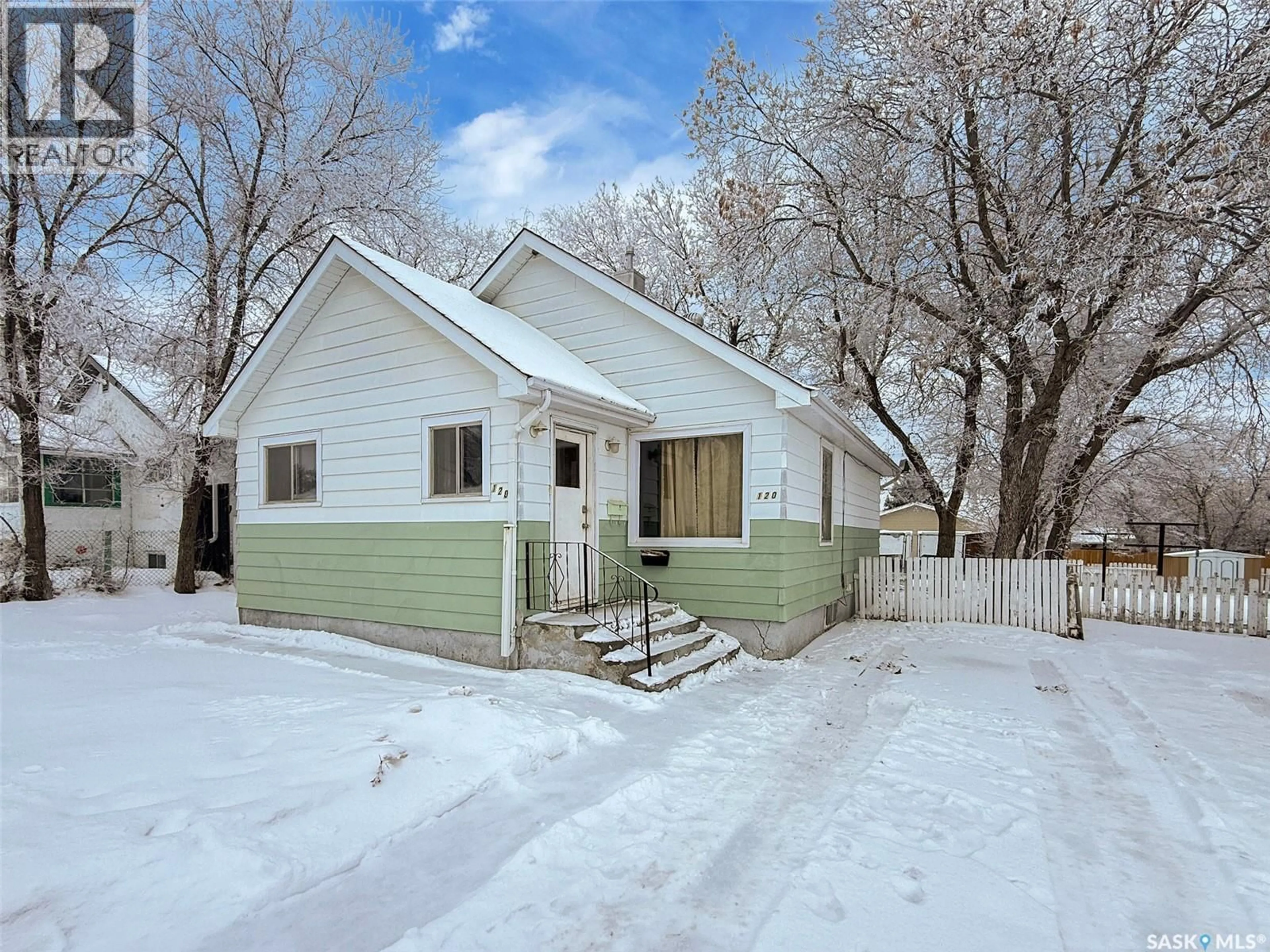 Home with vinyl exterior material, street for 120 CENTRAL AVENUE, Swift Current Saskatchewan S9H3E8