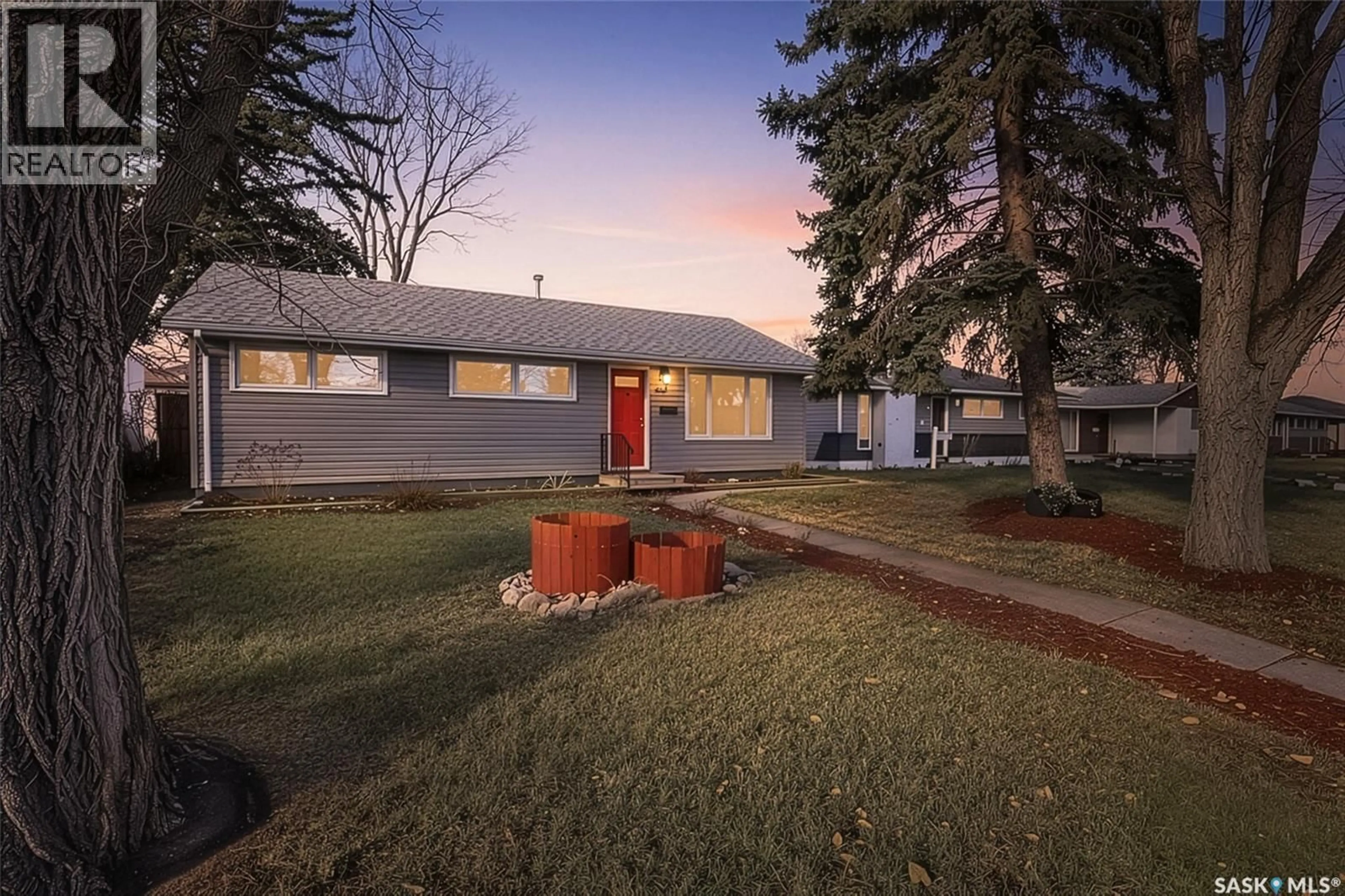 A pic from outside/outdoor area/front of a property/back of a property/a pic from drone, street for 1314 7TH AVENUE, Moose Jaw Saskatchewan S6H4C9
