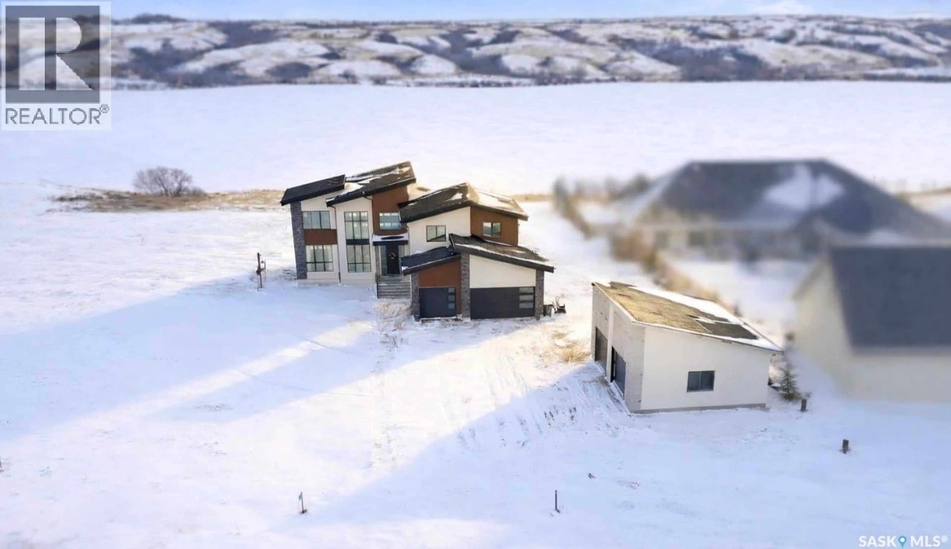 A pic from outside/outdoor area/front of a property/back of a property/a pic from drone, building for 91 SUNRISE DRIVE, Dundurn Rm No. 314 Saskatchewan S7C0A6