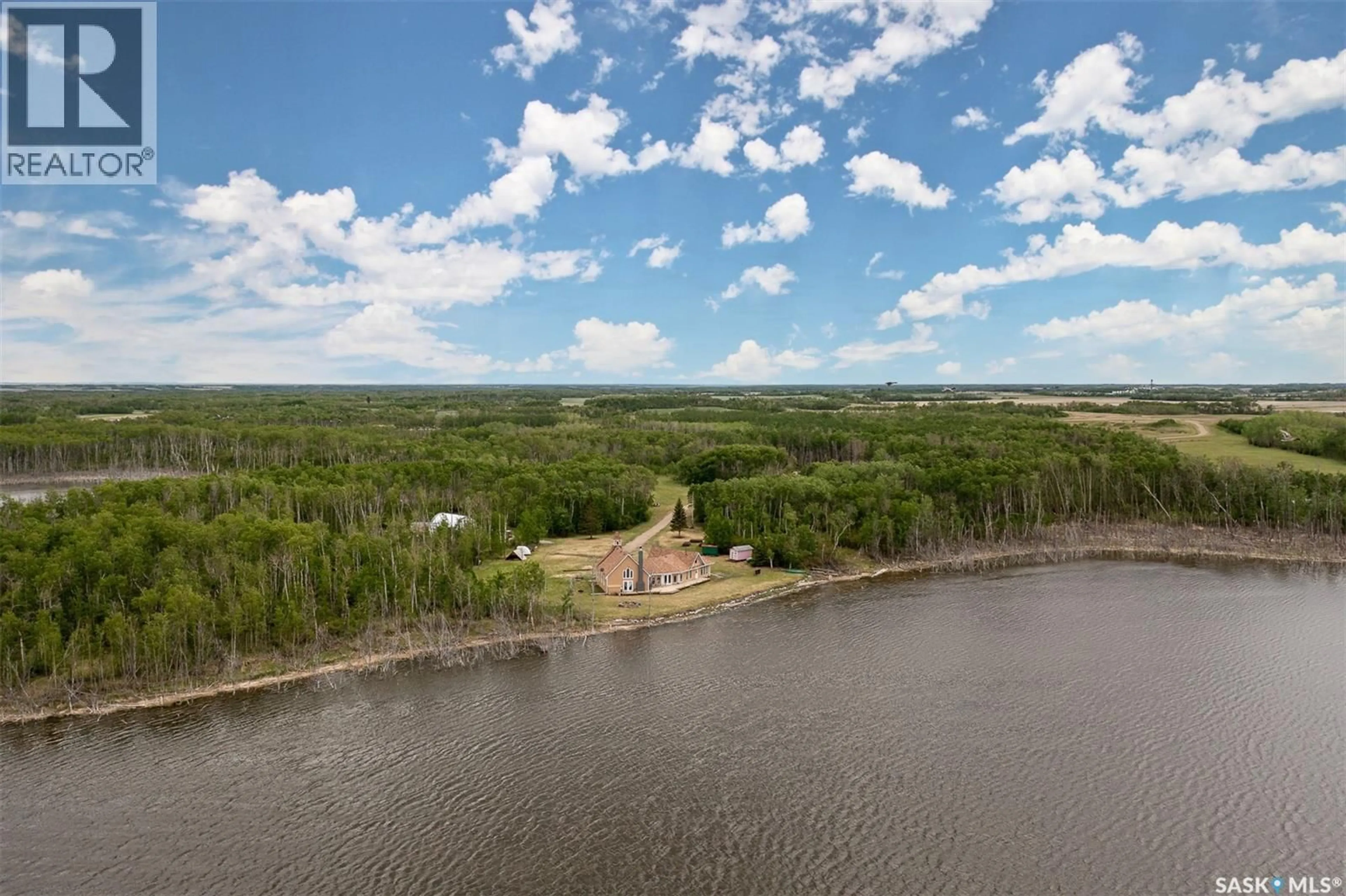 A pic from outside/outdoor area/front of a property/back of a property/a pic from drone, water/lake/river/ocean view for ROSE ACREAGE, Duck Lake Rm No. 463 Saskatchewan S0K1J0