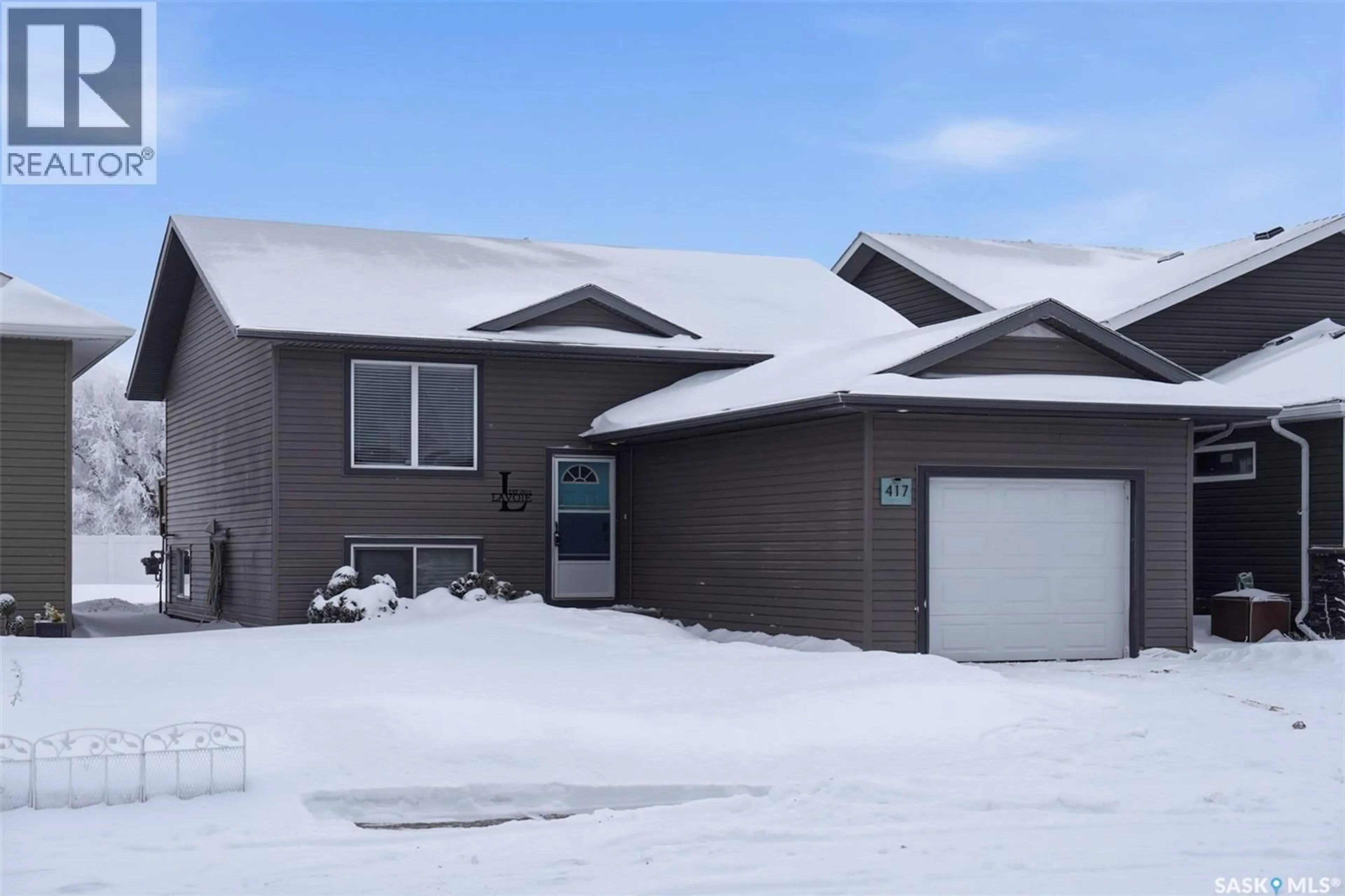 Home with vinyl exterior material, street for 417 MARTENS STREET, Warman Saskatchewan S0K4S3