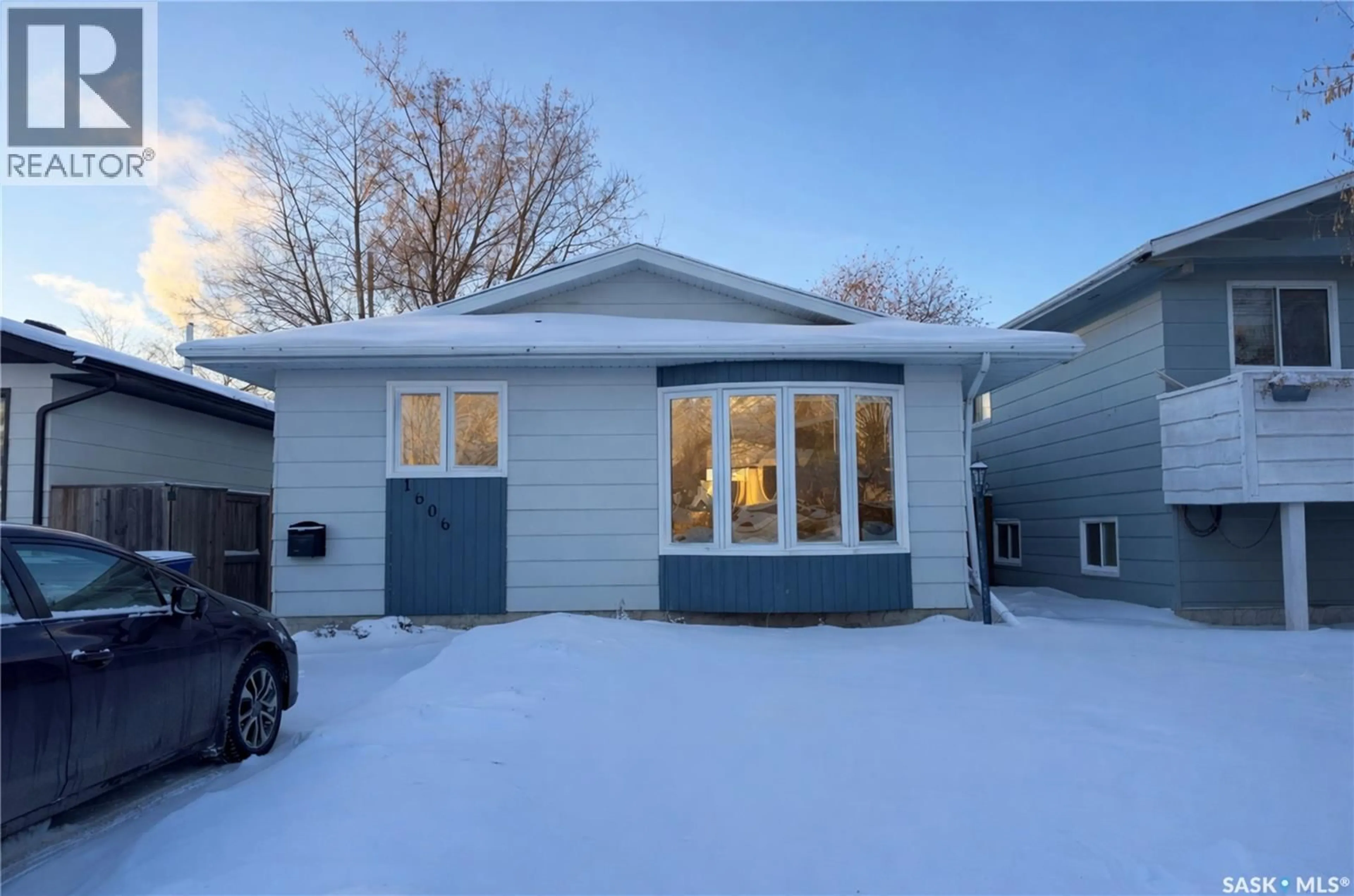 Home with vinyl exterior material, street for 1606 BRADWELL AVENUE, Saskatoon Saskatchewan S7N2P1