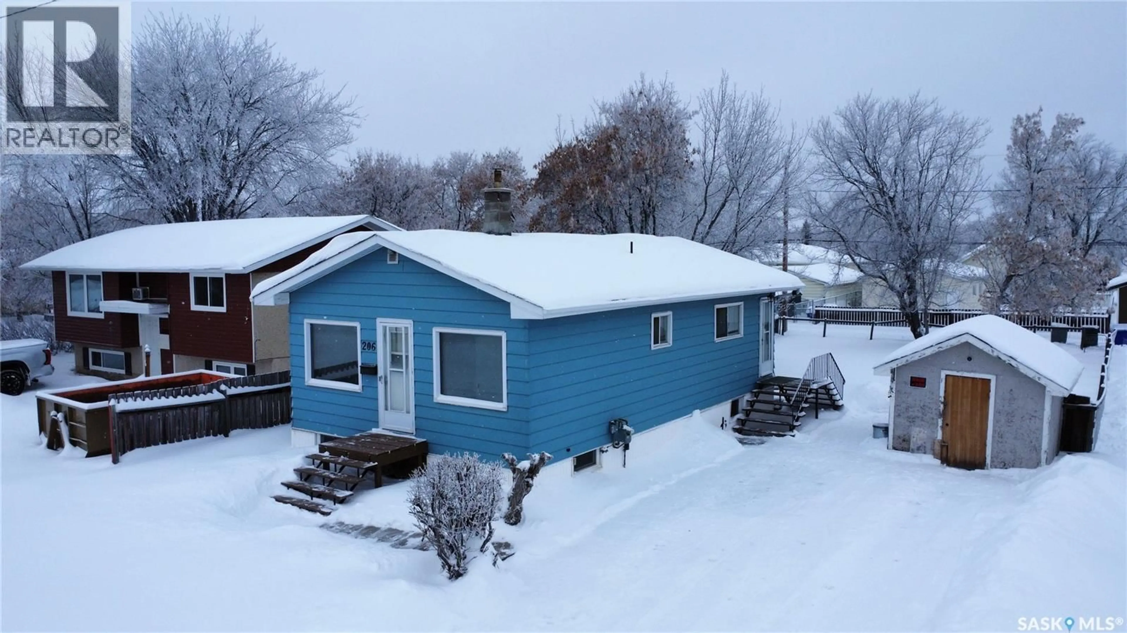 A pic from outside/outdoor area/front of a property/back of a property/a pic from drone, street for 206 31ST STREET, Prince Albert Saskatchewan S6V2A1