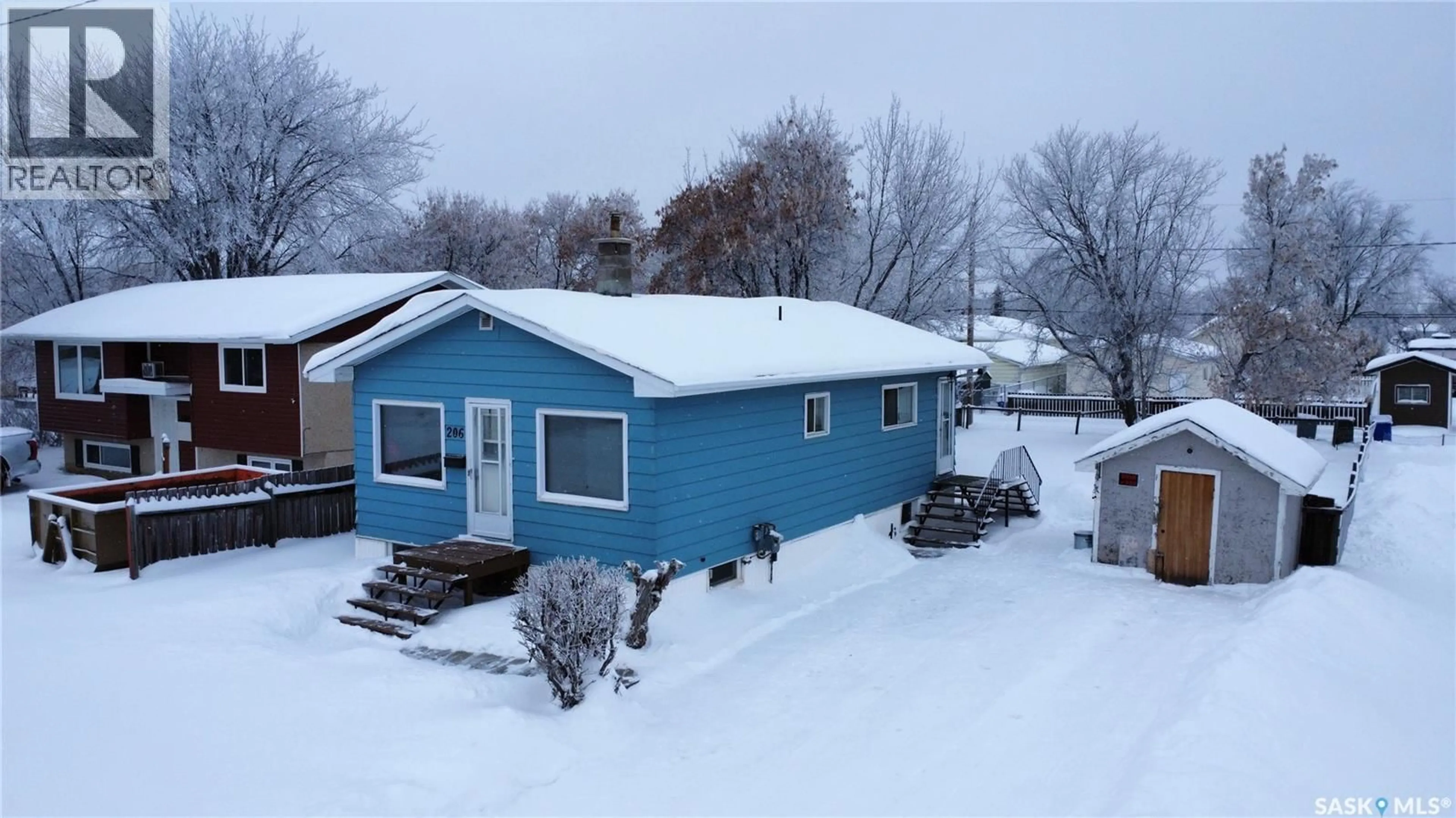 A pic from outside/outdoor area/front of a property/back of a property/a pic from drone, street for 206 31ST STREET, Prince Albert Saskatchewan S6V2A1