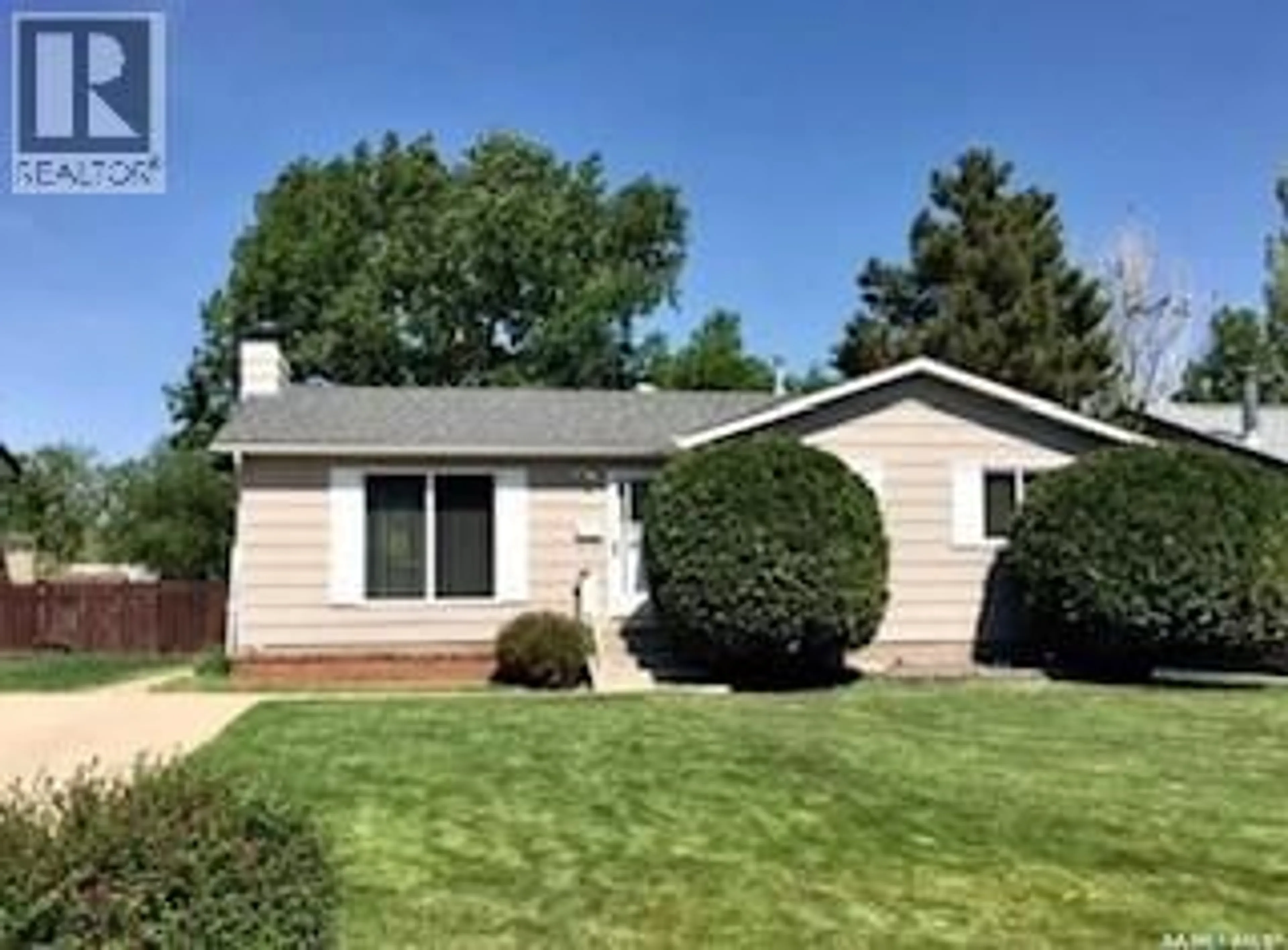 Home with vinyl exterior material, street for 413 HAYES DRIVE, Swift Current Saskatchewan S9H4H2